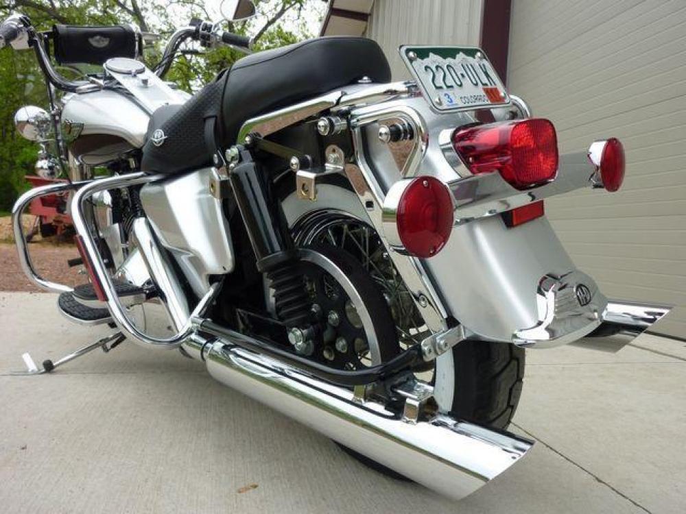 2003 Silver Other FLHRCI Road King 100th Anniversary Edition with an V2 engine, 5 Spd Manual transmission, located at 2510 47th St. Suite 200, Boulder, CO, 80301, (303) 641-0333, 40.026196, -105.243217 - 2003 Road King Anniversary Edition -- Screaming Eagle Pipes -- Stage 2 Engine Mod -- Near New Condition This classic Harley Road King is adorned with the two-tone Sterling Silver and Vivid Black paint scheme with 100th Anniversary striping, and she has just about all the extras you could wis - Photo #13