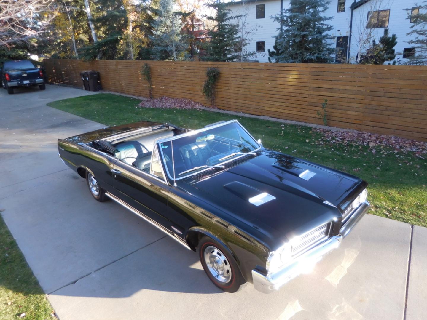 1964 Black /Black Pontiac GTO GTO Convertible Tri-Power (824B1318200) with an 389 cu. in. V8 engine, 4 Speed Manual transmission, located at 2510 47th St. Suite 200, Boulder, CO, 80301, (303) 641-0333, 40.026196, -105.243217 - "BIRTH of the MUSCLE CAR", March 1964 Car and Driver 0 to 60 mph 4.6 sec. 1964 Pontiac GTO. PHS Documented Correct. "Possibly ONE of ONE Ordered with these Specs", No PS or PB., Jim Mattison President, Pontiac Historical Services. "Maybe 10 Triple Black Tri-Power, 4 Speed Convertibles wer - Photo#2