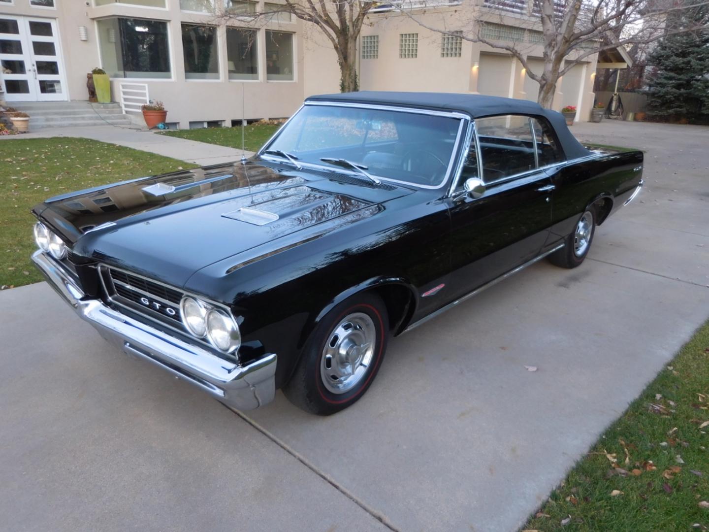 1964 Black /Black Pontiac GTO GTO Convertible Tri-Power (824B1318200) with an 389 cu. in. V8 engine, 4 Speed Manual transmission, located at 2510 47th St. Suite 200, Boulder, CO, 80301, (303) 641-0333, 40.026196, -105.243217 - "BIRTH of the MUSCLE CAR", March 1964 Car and Driver 0 to 60 mph 4.6 sec. 1964 Pontiac GTO. PHS Documented Correct. "Possibly ONE of ONE Ordered with these Specs", No PS or PB., Jim Mattison President, Pontiac Historical Services. "Maybe 10 Triple Black Tri-Power, 4 Speed Convertibles wer - Photo#0