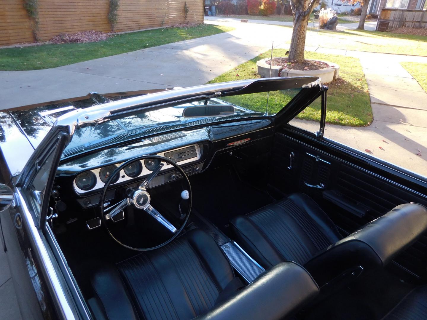 1964 Black /Black Pontiac GTO GTO Convertible Tri-Power (824B1318200) with an 389 cu. in. V8 engine, 4 Speed Manual transmission, located at 2510 47th St. Suite 200, Boulder, CO, 80301, (303) 641-0333, 40.026196, -105.243217 - "BIRTH of the MUSCLE CAR", March 1964 Car and Driver 0 to 60 mph 4.6 sec. 1964 Pontiac GTO. PHS Documented Correct. "Possibly ONE of ONE Ordered with these Specs", No PS or PB., Jim Mattison President, Pontiac Historical Services. "Maybe 10 Triple Black Tri-Power, 4 Speed Convertibles wer - Photo#15