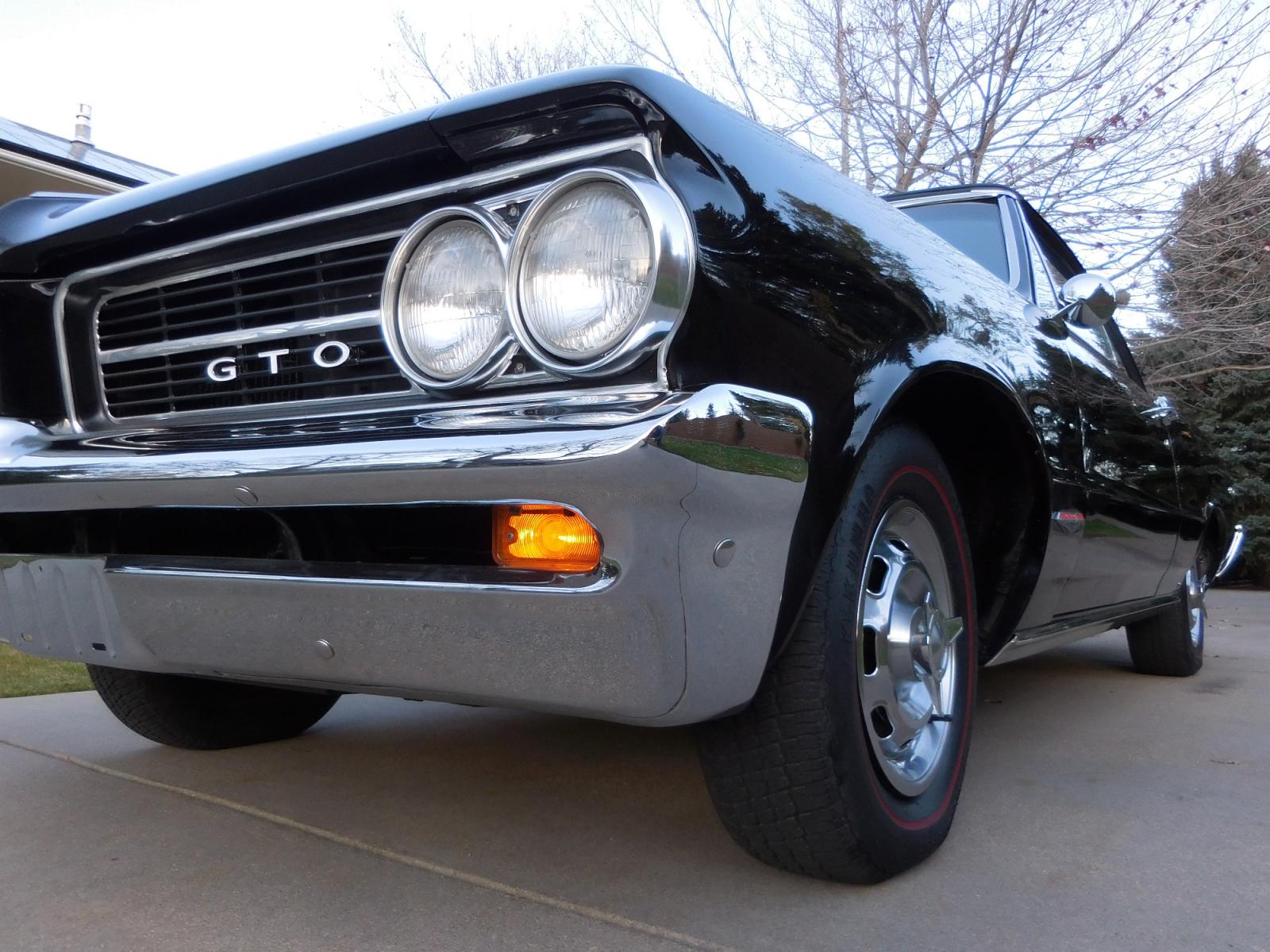 1964 Black /Black Pontiac GTO GTO Convertible Tri-Power (824B1318200) with an 389 cu. in. V8 engine, 4 Speed transmission, located at 2510 47th St. Suite 200, Boulder, CO, 80301, (303) 641-0333, 40.026196, -105.243217 - "BIRTH of the MUSCLE CAR", March 1964 Car and Driver 0 to 60 mph 4.6 sec. 1964 Pontiac GTO. PHS Documented Correct. "Possibly ONE of ONE Ordered with these Specs", No PS or PB., Jim Mattison President, Pontiac Historical Services. "Maybe 10 Triple Black Tri-Power, 4 Speed Convertibles wer - Photo #7