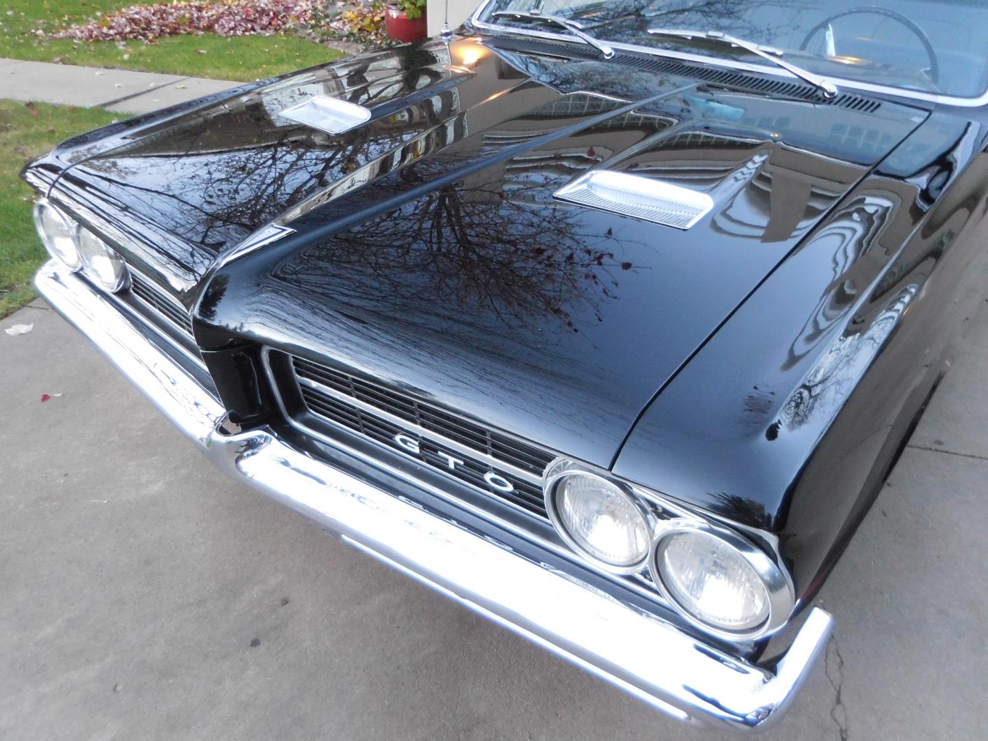 1964 Black /Black Pontiac GTO GTO Convertible Tri-Power (824B1318200) with an 389 cu. in. V8 engine, 4 Speed Manual transmission, located at 2510 47th St. Suite 200, Boulder, CO, 80301, (303) 641-0333, 40.026196, -105.243217 - "BIRTH of the MUSCLE CAR", March 1964 Car and Driver 0 to 60 mph 4.6 sec. 1964 Pontiac GTO. PHS Documented Correct. "Possibly ONE of ONE Ordered with these Specs", No PS or PB., Jim Mattison President, Pontiac Historical Services. "Maybe 10 Triple Black Tri-Power, 4 Speed Convertibles wer - Photo#29