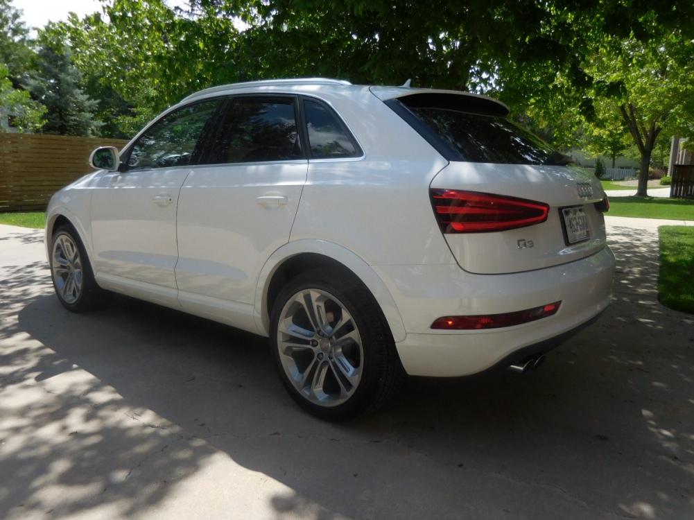 2015 White /Black Audi Q3 2.0T quattro Premium Plus (WA1EFCFS3FR) with an 2.0L L4 DOHC 24V engine, 6-Speed Automatic transmission, located at 2510 47th St. Suite 200, Boulder, CO, 80301, (303) 641-0333, 40.026196, -105.243217 - 2015 Audi Q3 2.0T Quattro Premium This Beautiful LOW Mileage, (53,800), ONE OWNER, All Wheel Drive, Non Smoker Q3 from Boulder was Recently Acquired by Boulder Motors in Boulder Colorado. It is Finished in Audis Stunning Glacier White Metallic with Onyx Black Heated Cowhide Seating. It of Cours - Photo #4