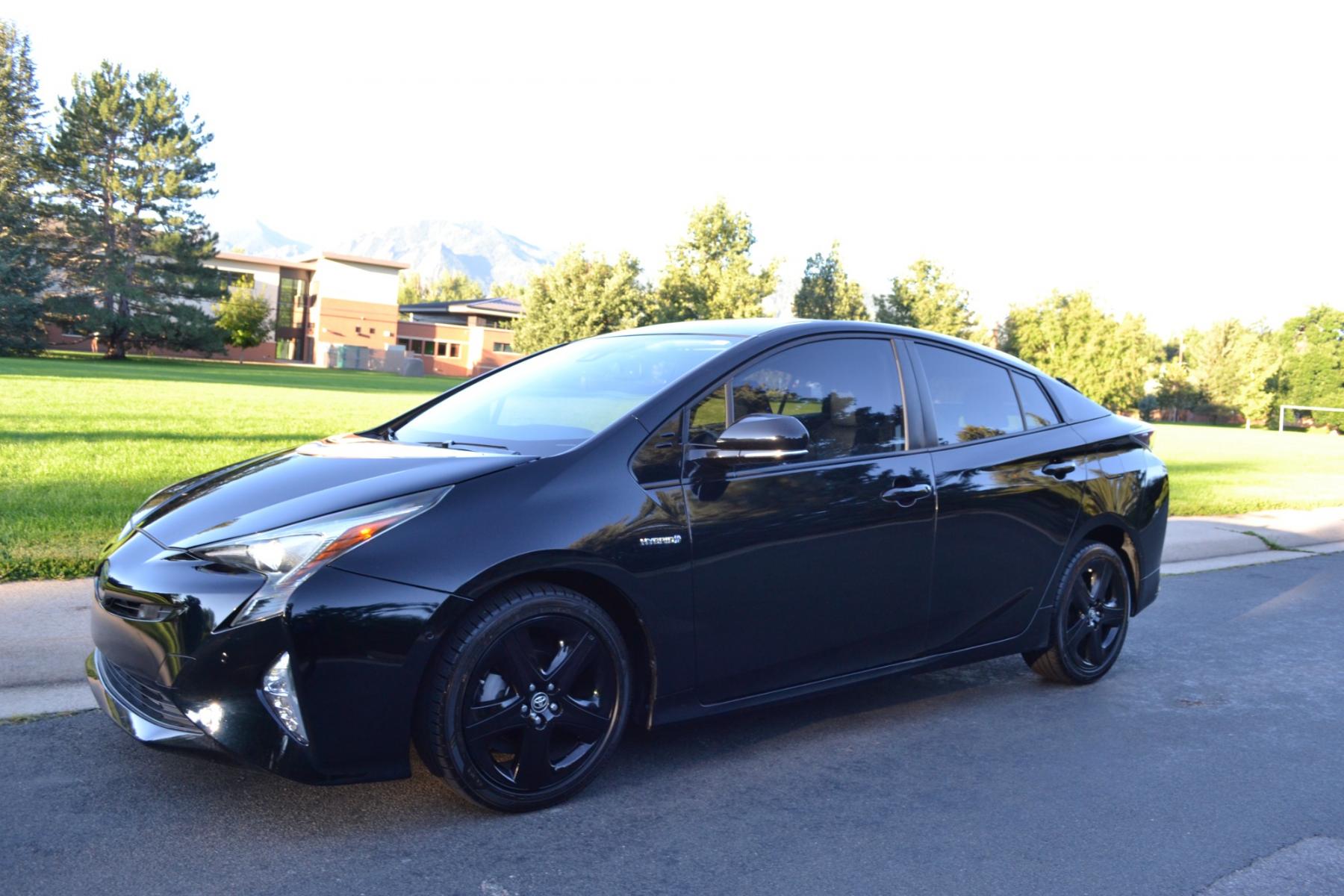 2016 Black /Black Toyota Prius IV Touring (JTDKARFU9G3) with an 1.8L L4 DOHC 16V HYBRID engine, CVT transmission, located at 2510 47th St. Suite 200, Boulder, CO, 80301, (303) 641-0333, 40.026196, -105.243217 - This Beautiful Low Mile, Toyota Prius IV was purchased new at Hamer Toyota in Mission Hills, CA and acquired by Boulder Motors, August 9, 2023, in Denver CO. A full Premium Synthetic Oil Service and Multi-Point Inspection were performed by Corwin Toyota in Boulder CO. August 11, 2023. A Clean Clear - Photo #0