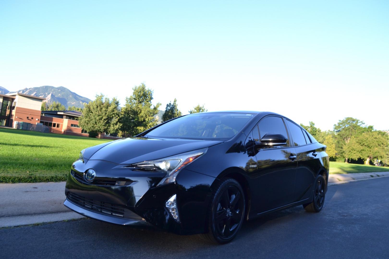 2016 Black /Black Toyota Prius IV Touring (JTDKARFU9G3) with an 1.8L L4 DOHC 16V HYBRID engine, CVT transmission, located at 2510 47th St. Suite 200, Boulder, CO, 80301, (303) 641-0333, 40.026196, -105.243217 - This Beautiful Low Mile, Toyota Prius IV was purchased new at Hamer Toyota in Mission Hills, CA and acquired by Boulder Motors, August 9, 2023, in Denver CO. A full Premium Synthetic Oil Service and Multi-Point Inspection were performed by Corwin Toyota in Boulder CO. August 11, 2023. A Clean Clear - Photo#1