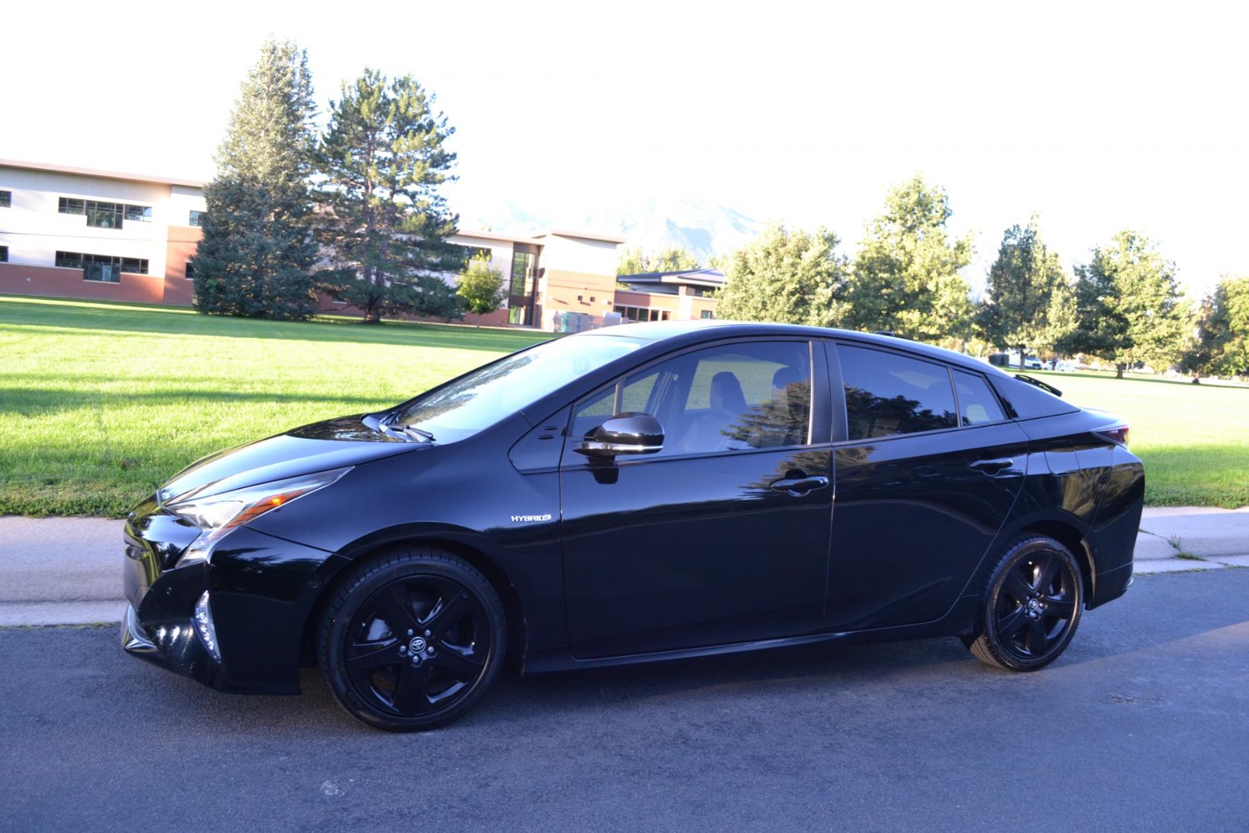 2016 Black /Black Toyota Prius IV Touring (JTDKARFU9G3) with an 1.8L L4 DOHC 16V HYBRID engine, CVT transmission, located at 2510 47th St. Suite 200, Boulder, CO, 80301, (303) 641-0333, 40.026196, -105.243217 - This Beautiful Low Mile, Toyota Prius IV was purchased new at Hamer Toyota in Mission Hills, CA and acquired by Boulder Motors, August 9, 2023, in Denver CO. A full Premium Synthetic Oil Service and Multi-Point Inspection were performed by Corwin Toyota in Boulder CO. August 11, 2023. A Clean Clear - Photo #3