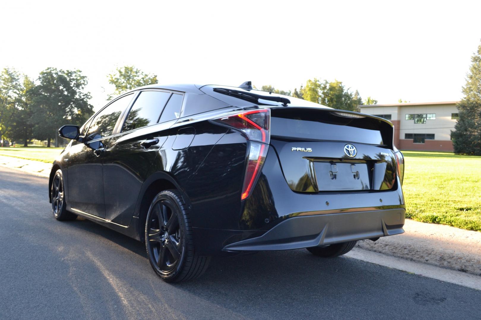 2016 Black /Black Toyota Prius IV Touring (JTDKARFU9G3) with an 1.8L L4 DOHC 16V HYBRID engine, CVT transmission, located at 2510 47th St. Suite 200, Boulder, CO, 80301, (303) 641-0333, 40.026196, -105.243217 - This Beautiful Low Mile, Toyota Prius IV was purchased new at Hamer Toyota in Mission Hills, CA and acquired by Boulder Motors, August 9, 2023, in Denver CO. A full Premium Synthetic Oil Service and Multi-Point Inspection were performed by Corwin Toyota in Boulder CO. August 11, 2023. A Clean Clear - Photo#5