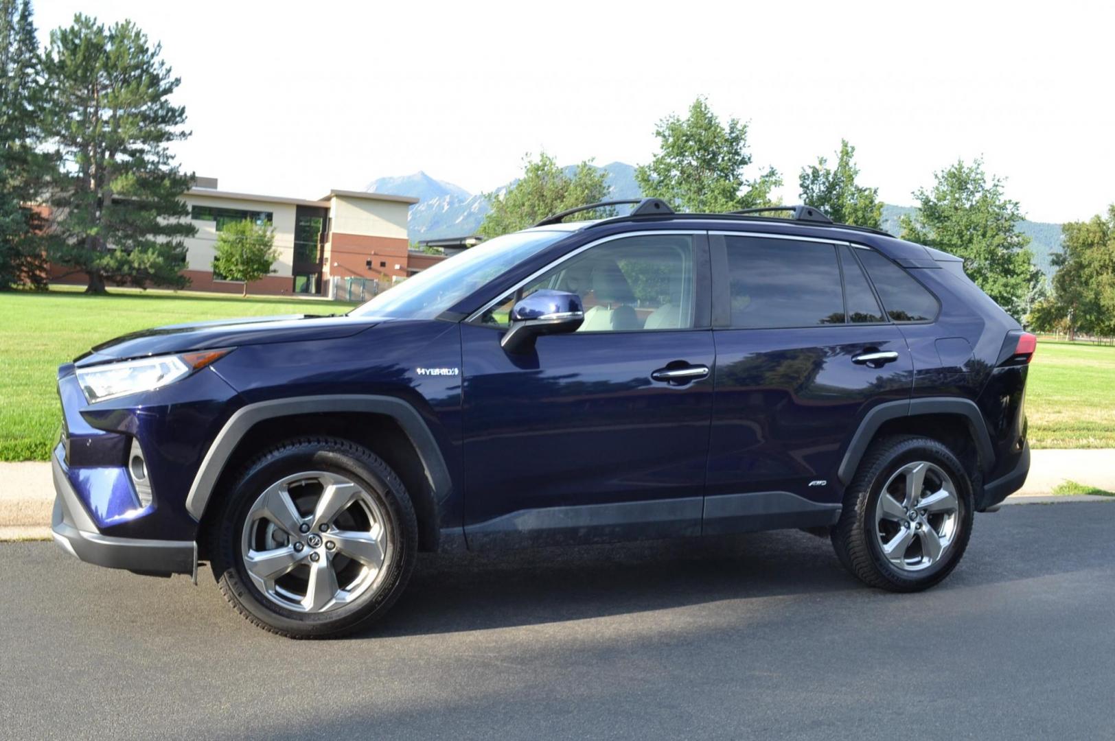 2019 /Grey Toyota RAV4 Hybrid Limited (JTMDWRFVXKJ) with an 2.5L L4 DOHC 16V HYBRID engine, CVT transmission, located at 2510 47th St. Suite 200, Boulder, CO, 80301, (303) 641-0333, 40.026196, -105.243217 - This Beautiful Low Mileage, ONE OWNER, AWD Limited Rav4 is a Recent Boulder Acquisition by Boulder Motors in Boulder Colorado. Finished Toyotas Stunning Dark Blue Metallic with Dove Gray Heated Leather Seating. Corwin Toyota in Boulder Just completed a Fresh Service and Inspection in April of 2024. - Photo#0