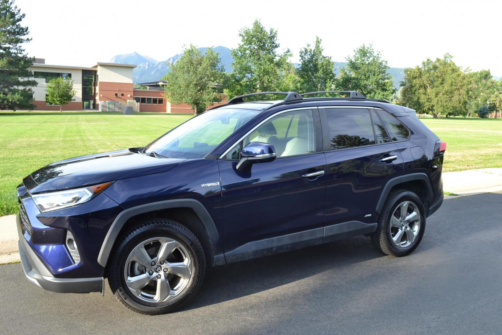 2019 /Grey Toyota RAV4 Hybrid Limited (JTMDWRFVXKJ) with an 2.5L L4 DOHC 16V HYBRID engine, CVT transmission, located at 2510 47th St. Suite 200, Boulder, CO, 80301, (303) 641-0333, 40.026196, -105.243217 - This Beautiful Low Mileage, ONE OWNER, AWD Limited Rav4 is a Recent Boulder Acquisition by Boulder Motors in Boulder Colorado. Finished Toyotas Stunning Dark Blue Metallic with Dove Gray Heated Leather Seating. Corwin Toyota in Boulder Just completed a Fresh Service and Inspection in April of 2024. - Photo#1