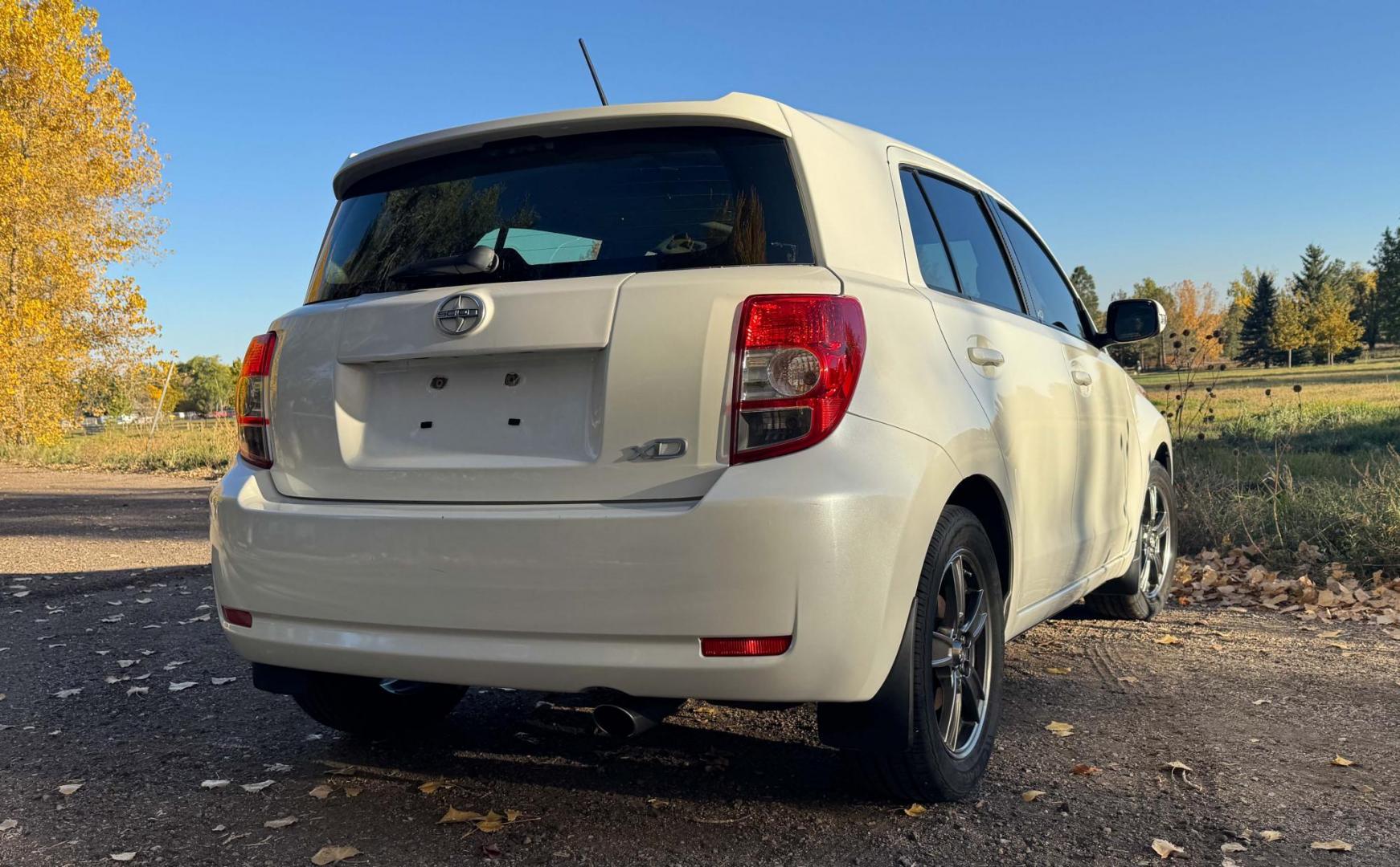 2012 White /Grey Scion xD XDHatchback Release Series (JTKKU4B43C1) with an 1.8L L4 DOHC16V engine, Automatic transmission, located at 2510 47th St. Suite 200, Boulder, CO, 80301, (303) 641-0333, 40.026196, -105.243217 - Photo#3