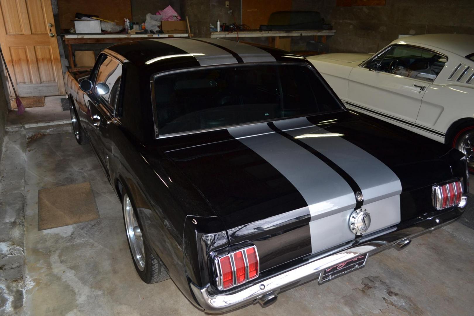 1965 Black /black Ford Mustang Standard (5F07A668786) with an 306ci engine, Manual transmission, located at 2510 47th St. Suite 200, Boulder, CO, 80301, (303) 641-0333, 40.026196, -105.243217 - This Custom Pro-Touring 1965 Mustang Coupe is Powered by a Newly Built 306ci Roller Engine with High Performance Cam, Roller Rockers and Aluminum Heads and Intake, (Edlebrock), Backed by a Tremec T5 5-Speed Manual Transmission and a Ford 9-inch Posi-Traction Rear Axle. It exhales through Ceramic Co - Photo#16