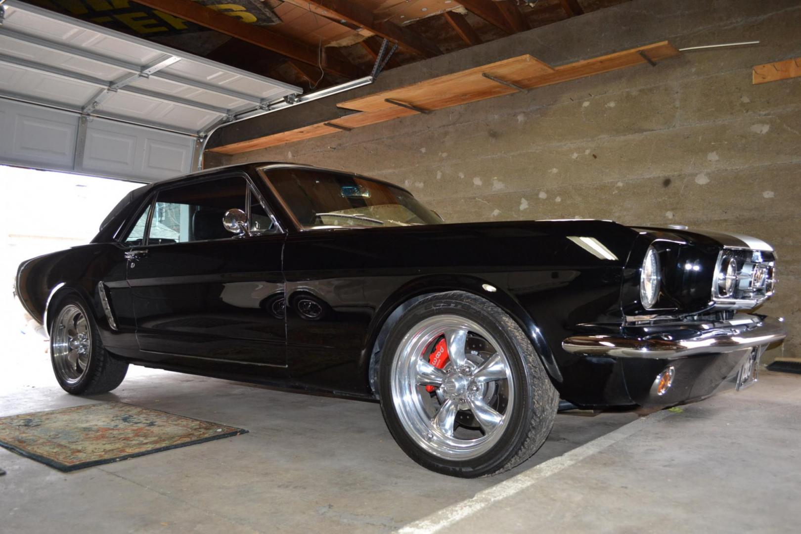 1965 Black /black Ford Mustang Standard (5F07A668786) with an 306ci engine, Manual transmission, located at 2510 47th St. Suite 200, Boulder, CO, 80301, (303) 641-0333, 40.026196, -105.243217 - This Custom Pro-Touring 1965 Mustang Coupe is Powered by a Newly Built 306ci Roller Engine with High Performance Cam, Roller Rockers and Aluminum Heads and Intake, (Edlebrock), Backed by a Tremec T5 5-Speed Manual Transmission and a Ford 9-inch Posi-Traction Rear Axle. It exhales through Ceramic Co - Photo#1