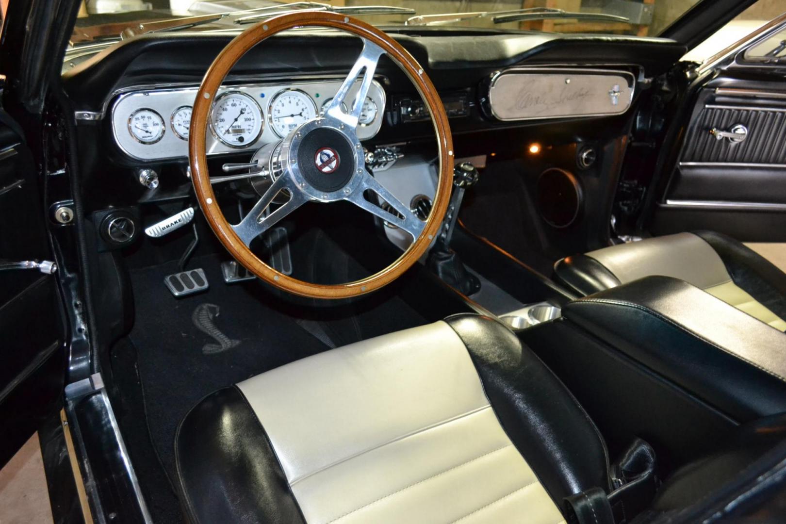 1965 Black /black Ford Mustang Standard (5F07A668786) with an 306ci engine, Manual transmission, located at 2510 47th St. Suite 200, Boulder, CO, 80301, (303) 641-0333, 40.026196, -105.243217 - This Custom Pro-Touring 1965 Mustang Coupe is Powered by a Newly Built 306ci Roller Engine with High Performance Cam, Roller Rockers and Aluminum Heads and Intake, (Edlebrock), Backed by a Tremec T5 5-Speed Manual Transmission and a Ford 9-inch Posi-Traction Rear Axle. It exhales through Ceramic Co - Photo#6