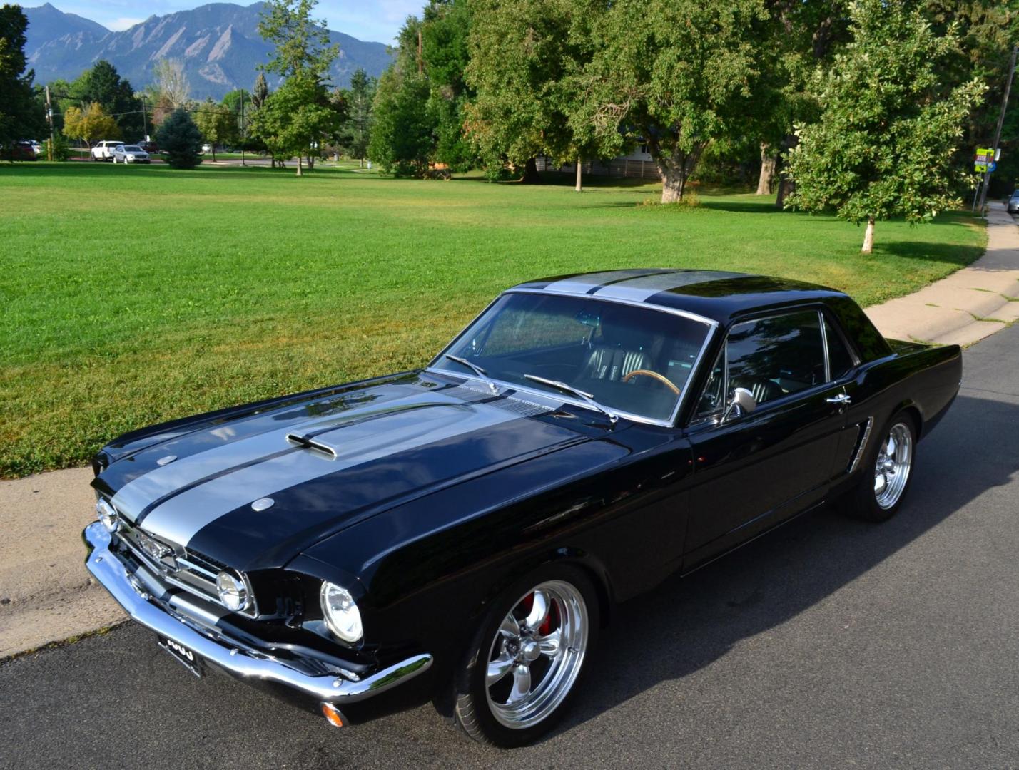 1965 Black /black Ford Mustang Standard (5F07A668786) with an 306ci engine, Manual transmission, located at 2510 47th St. Suite 200, Boulder, CO, 80301, (303) 641-0333, 40.026196, -105.243217 - This Custom Pro-Touring 1965 Mustang Coupe is Powered by a Newly Built 306ci Roller Engine with High Performance Cam, Roller Rockers and Aluminum Heads and Intake, (Edlebrock), Backed by a Tremec T5 5-Speed Manual Transmission and a Ford 9-inch Posi-Traction Rear Axle. It exhales through Ceramic Co - Photo#0