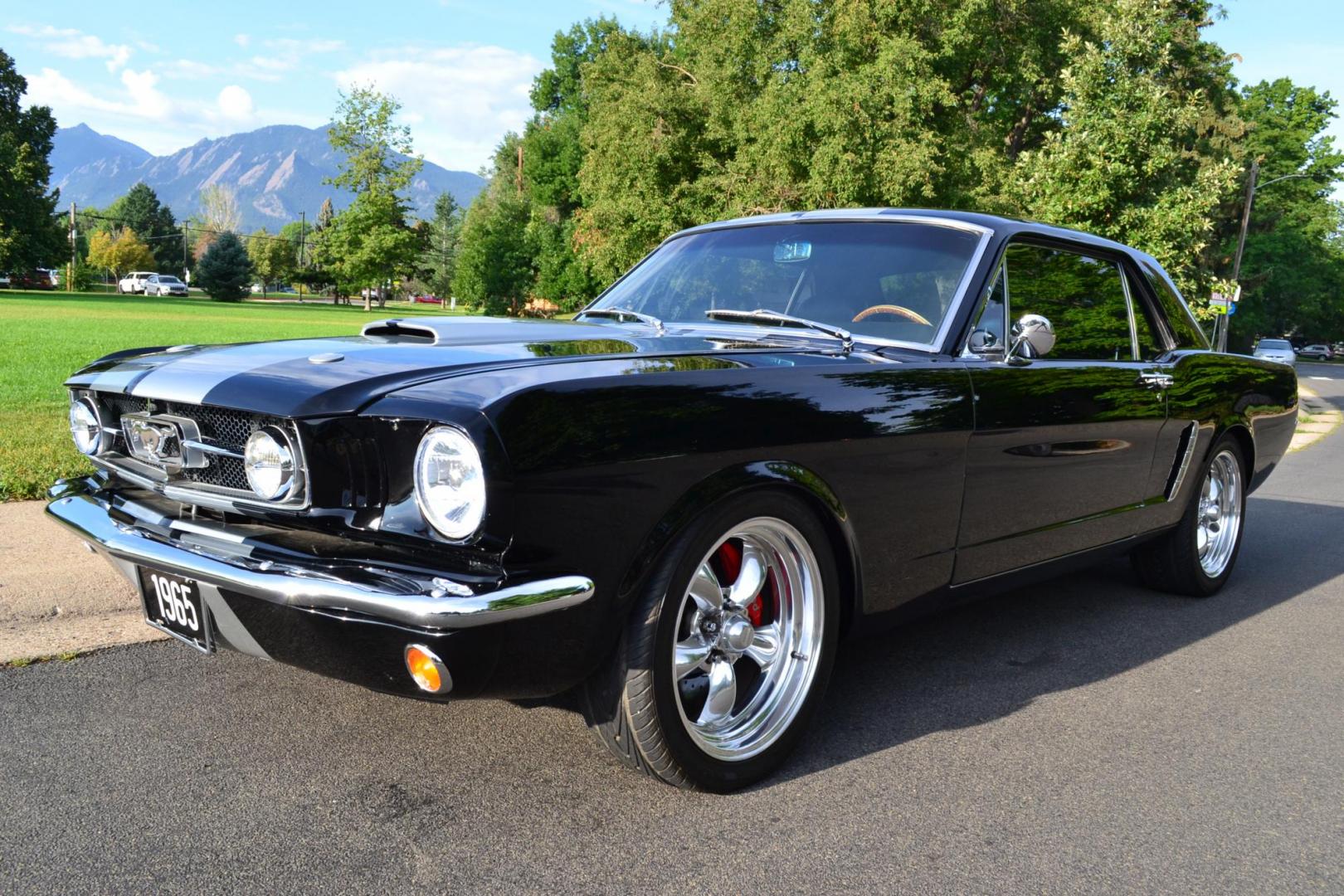 1965 Black /black Ford Mustang Standard (5F07A668786) with an 306ci engine, Manual transmission, located at 2510 47th St. Suite 200, Boulder, CO, 80301, (303) 641-0333, 40.026196, -105.243217 - This Custom Pro-Touring 1965 Mustang Coupe is Powered by a Newly Built 306ci Roller Engine with High Performance Cam, Roller Rockers and Aluminum Heads and Intake, (Edlebrock), Backed by a Tremec T5 5-Speed Manual Transmission and a Ford 9-inch Posi-Traction Rear Axle. It exhales through Ceramic Co - Photo#2