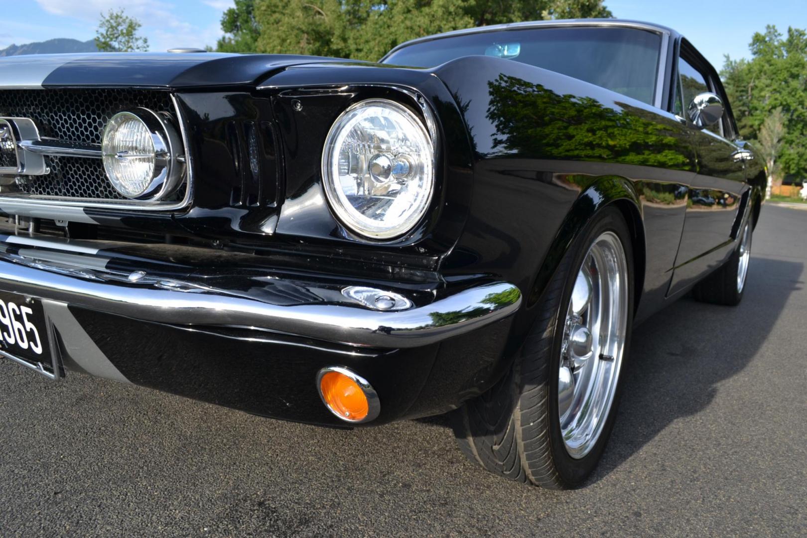 1965 Black /black Ford Mustang Standard (5F07A668786) with an 306ci engine, Manual transmission, located at 2510 47th St. Suite 200, Boulder, CO, 80301, (303) 641-0333, 40.026196, -105.243217 - This Custom Pro-Touring 1965 Mustang Coupe is Powered by a Newly Built 306ci Roller Engine with High Performance Cam, Roller Rockers and Aluminum Heads and Intake, (Edlebrock), Backed by a Tremec T5 5-Speed Manual Transmission and a Ford 9-inch Posi-Traction Rear Axle. It exhales through Ceramic Co - Photo#6