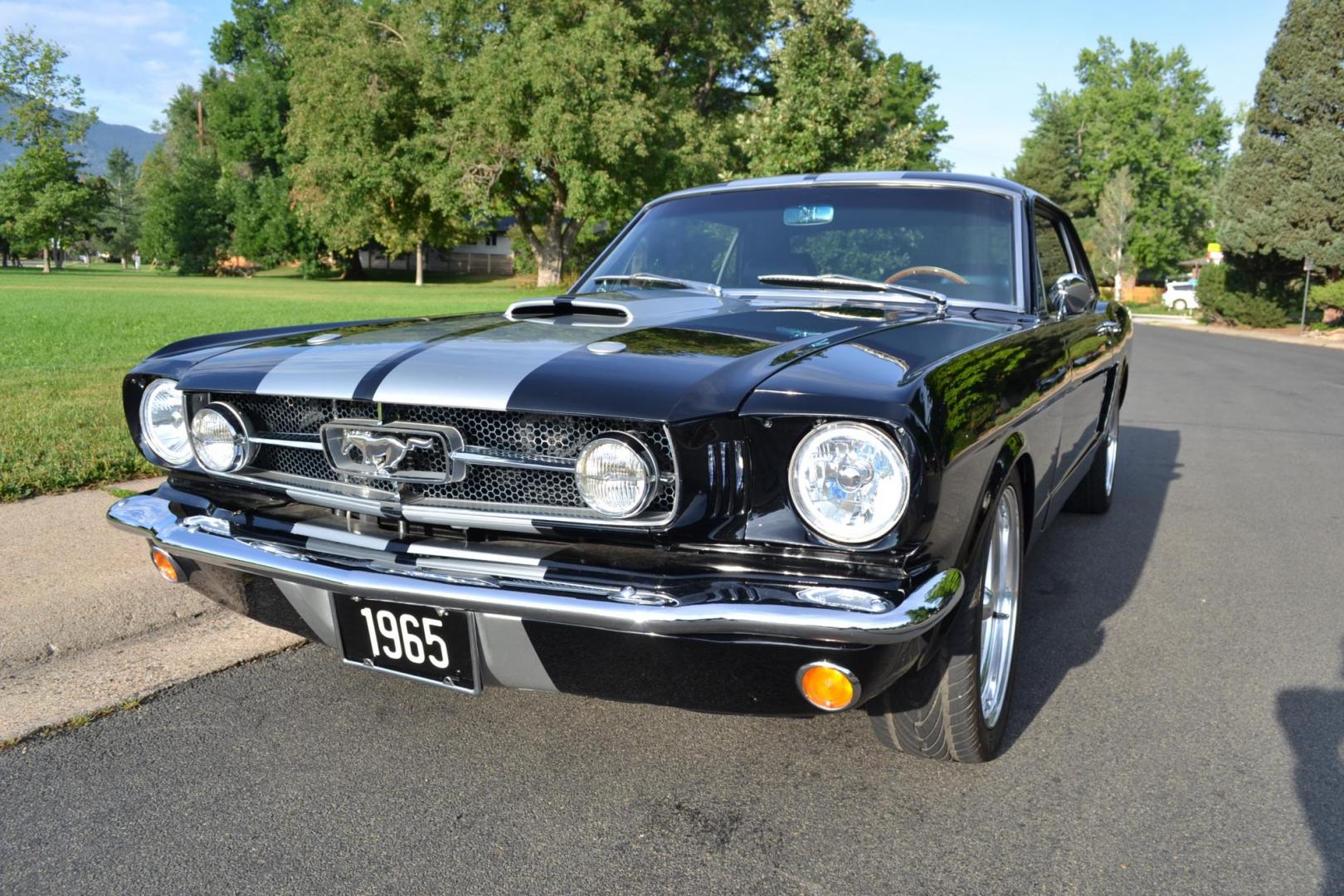1965 Black /black Ford Mustang Standard (5F07A668786) with an 306ci engine, Manual transmission, located at 2510 47th St. Suite 200, Boulder, CO, 80301, (303) 641-0333, 40.026196, -105.243217 - This Custom Pro-Touring 1965 Mustang Coupe is Powered by a Newly Built 306ci Roller Engine with High Performance Cam, Roller Rockers and Aluminum Heads and Intake, (Edlebrock), Backed by a Tremec T5 5-Speed Manual Transmission and a Ford 9-inch Posi-Traction Rear Axle. It exhales through Ceramic Co - Photo#5