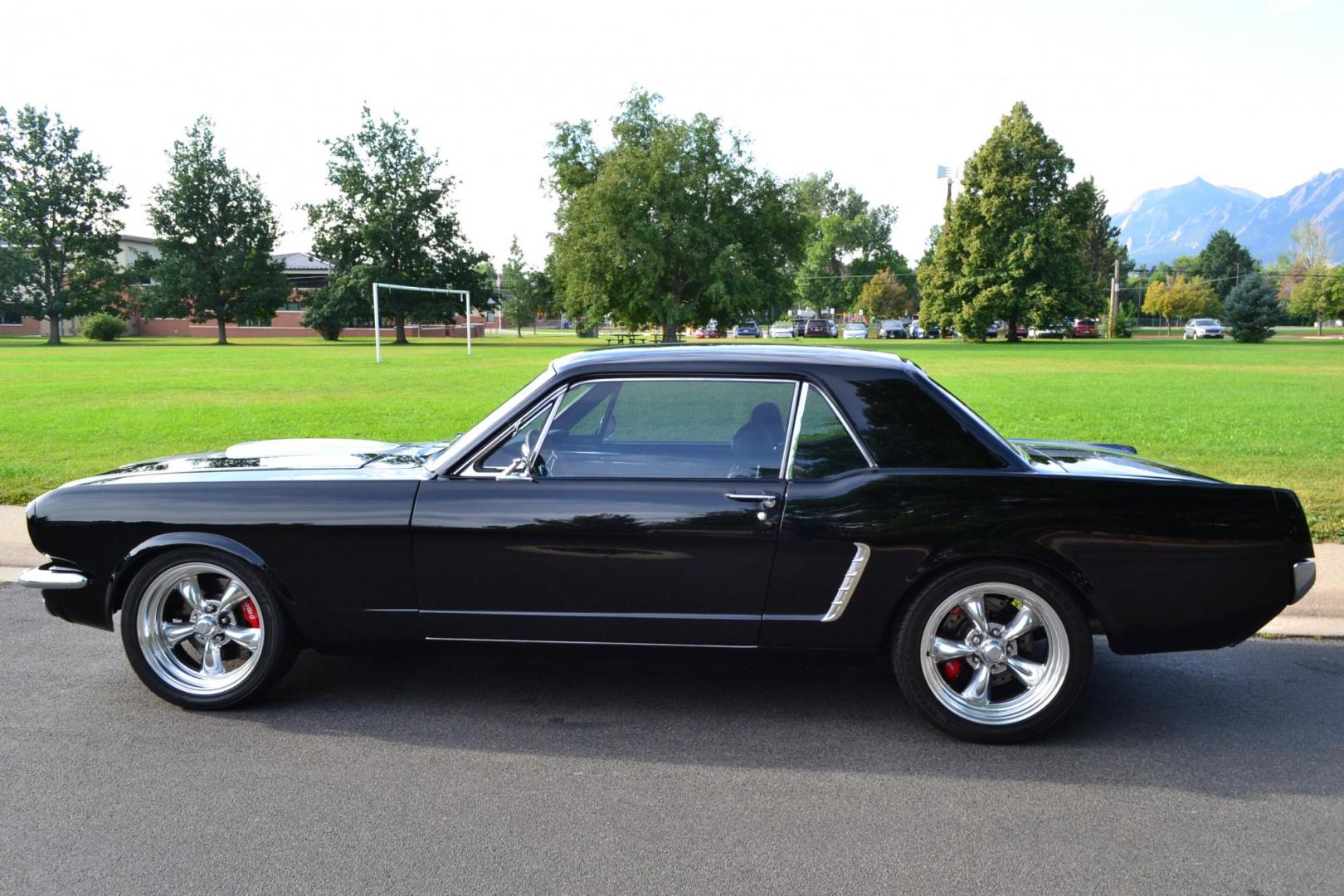 1965 Black /black Ford Mustang Standard (5F07A668786) with an 306ci engine, Manual transmission, located at 2510 47th St. Suite 200, Boulder, CO, 80301, (303) 641-0333, 40.026196, -105.243217 - This Custom Pro-Touring 1965 Mustang Coupe is Powered by a Newly Built 306ci Roller Engine with High Performance Cam, Roller Rockers and Aluminum Heads and Intake, (Edlebrock), Backed by a Tremec T5 5-Speed Manual Transmission and a Ford 9-inch Posi-Traction Rear Axle. It exhales through Ceramic Co - Photo#8