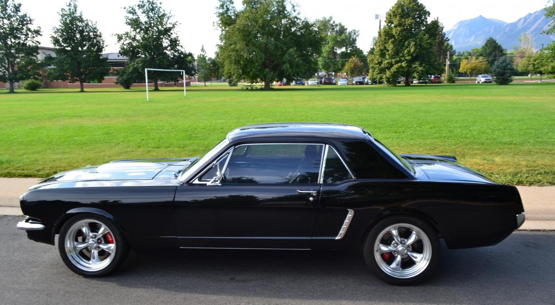 1965 Black /black Ford Mustang Standard (5F07A668786) with an 306ci engine, Manual transmission, located at 2510 47th St. Suite 200, Boulder, CO, 80301, (303) 641-0333, 40.026196, -105.243217 - This Custom Pro-Touring 1965 Mustang Coupe is Powered by a Newly Built 306ci Roller Engine with High Performance Cam, Roller Rockers and Aluminum Heads and Intake, (Edlebrock), Backed by a Tremec T5 5-Speed Manual Transmission and a Ford 9-inch Posi-Traction Rear Axle. It exhales through Ceramic Co - Photo#9