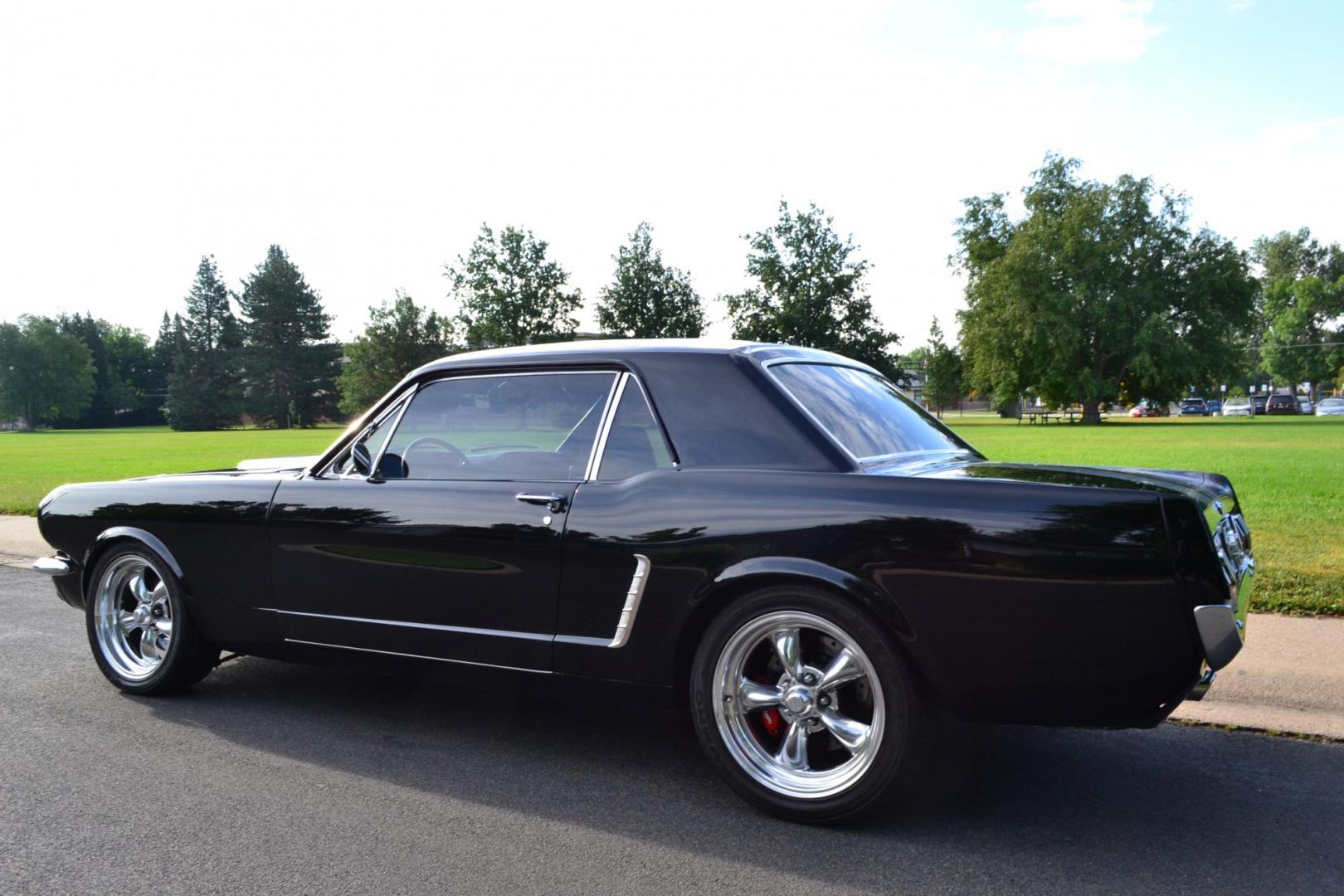 1965 Black /black Ford Mustang Standard (5F07A668786) with an 306ci engine, Manual transmission, located at 2510 47th St. Suite 200, Boulder, CO, 80301, (303) 641-0333, 40.026196, -105.243217 - This Custom Pro-Touring 1965 Mustang Coupe is Powered by a Newly Built 306ci Roller Engine with High Performance Cam, Roller Rockers and Aluminum Heads and Intake, (Edlebrock), Backed by a Tremec T5 5-Speed Manual Transmission and a Ford 9-inch Posi-Traction Rear Axle. It exhales through Ceramic Co - Photo#11