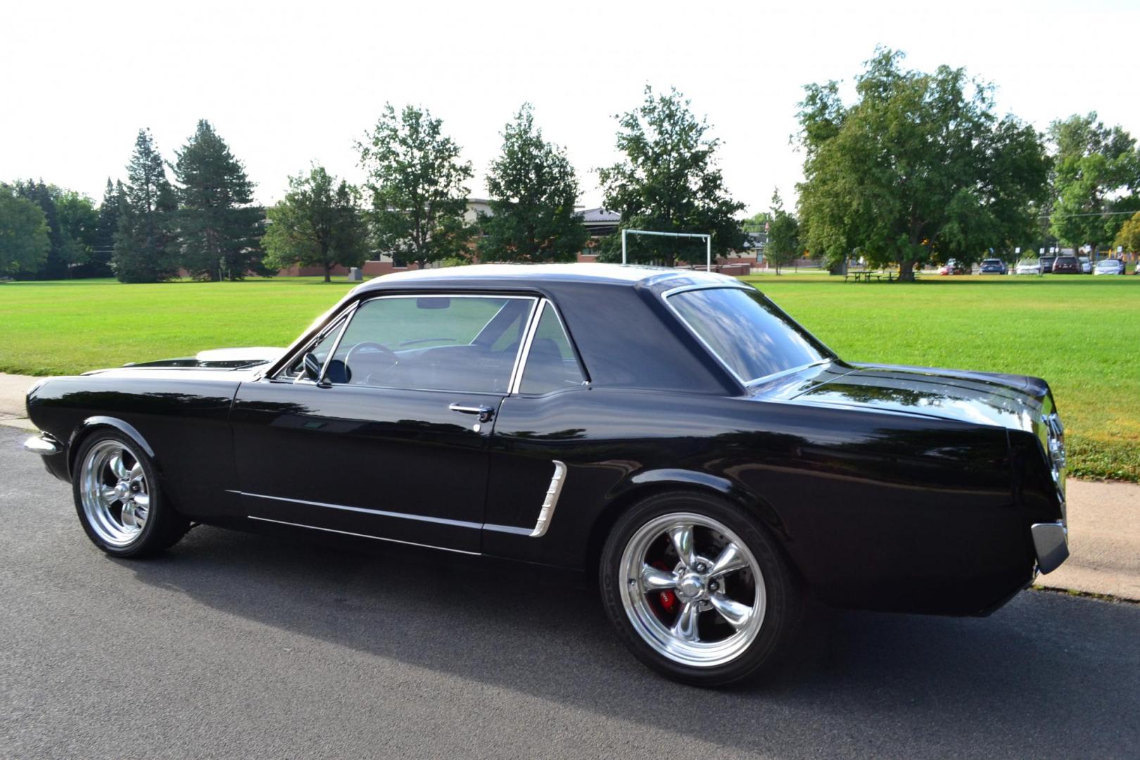 1965 Black /black Ford Mustang Standard (5F07A668786) with an 306ci engine, Manual transmission, located at 2510 47th St. Suite 200, Boulder, CO, 80301, (303) 641-0333, 40.026196, -105.243217 - This Custom Pro-Touring 1965 Mustang Coupe is Powered by a Newly Built 306ci Roller Engine with High Performance Cam, Roller Rockers and Aluminum Heads and Intake, (Edlebrock), Backed by a Tremec T5 5-Speed Manual Transmission and a Ford 9-inch Posi-Traction Rear Axle. It exhales through Ceramic Co - Photo#10
