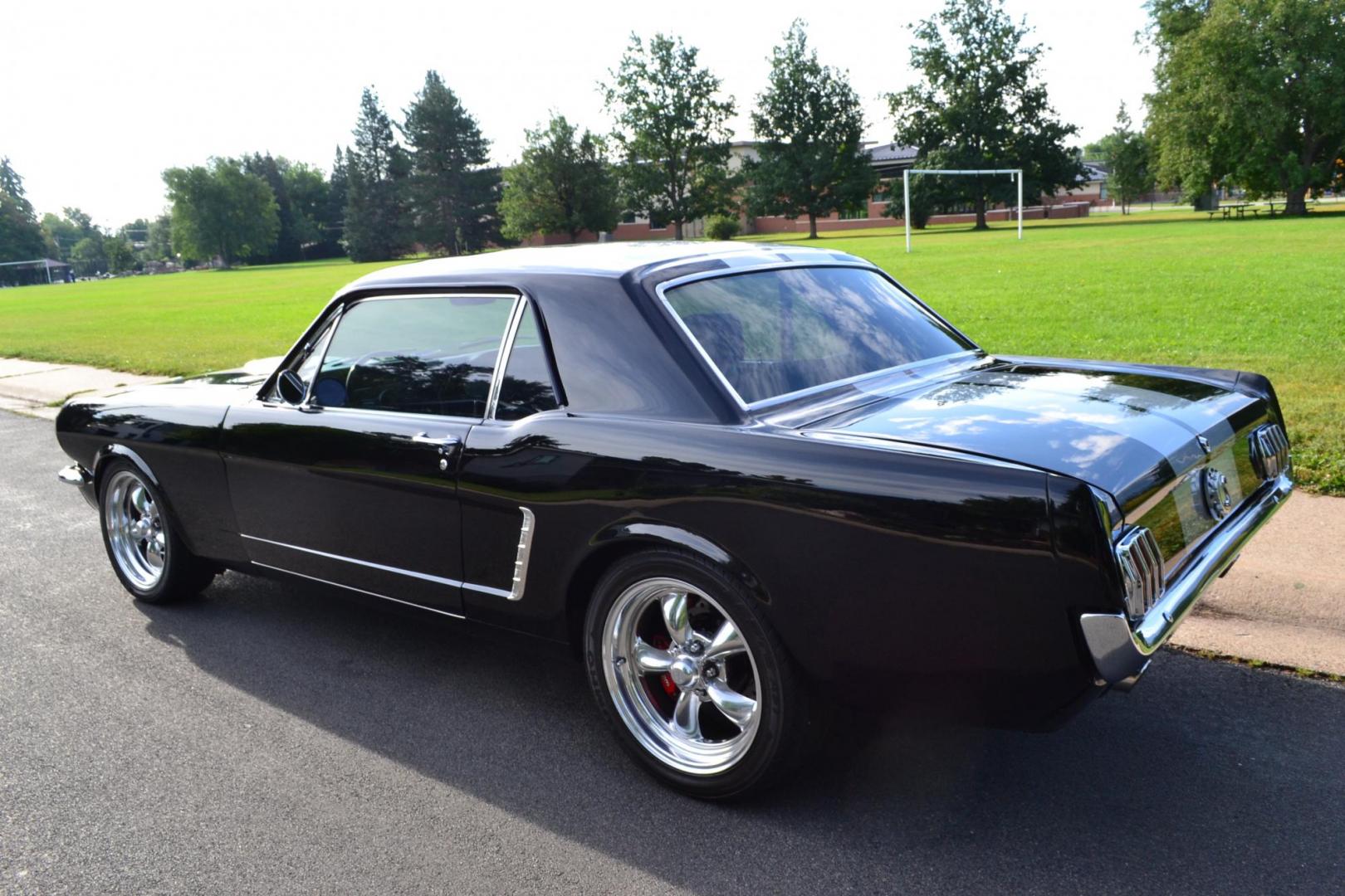 1965 Black /black Ford Mustang Standard (5F07A668786) with an 306ci engine, Manual transmission, located at 2510 47th St. Suite 200, Boulder, CO, 80301, (303) 641-0333, 40.026196, -105.243217 - This Custom Pro-Touring 1965 Mustang Coupe is Powered by a Newly Built 306ci Roller Engine with High Performance Cam, Roller Rockers and Aluminum Heads and Intake, (Edlebrock), Backed by a Tremec T5 5-Speed Manual Transmission and a Ford 9-inch Posi-Traction Rear Axle. It exhales through Ceramic Co - Photo#12