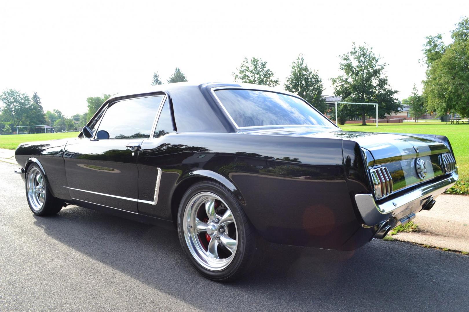1965 Black /black Ford Mustang Standard (5F07A668786) with an 306ci engine, Manual transmission, located at 2510 47th St. Suite 200, Boulder, CO, 80301, (303) 641-0333, 40.026196, -105.243217 - This Custom Pro-Touring 1965 Mustang Coupe is Powered by a Newly Built 306ci Roller Engine with High Performance Cam, Roller Rockers and Aluminum Heads and Intake, (Edlebrock), Backed by a Tremec T5 5-Speed Manual Transmission and a Ford 9-inch Posi-Traction Rear Axle. It exhales through Ceramic Co - Photo#16