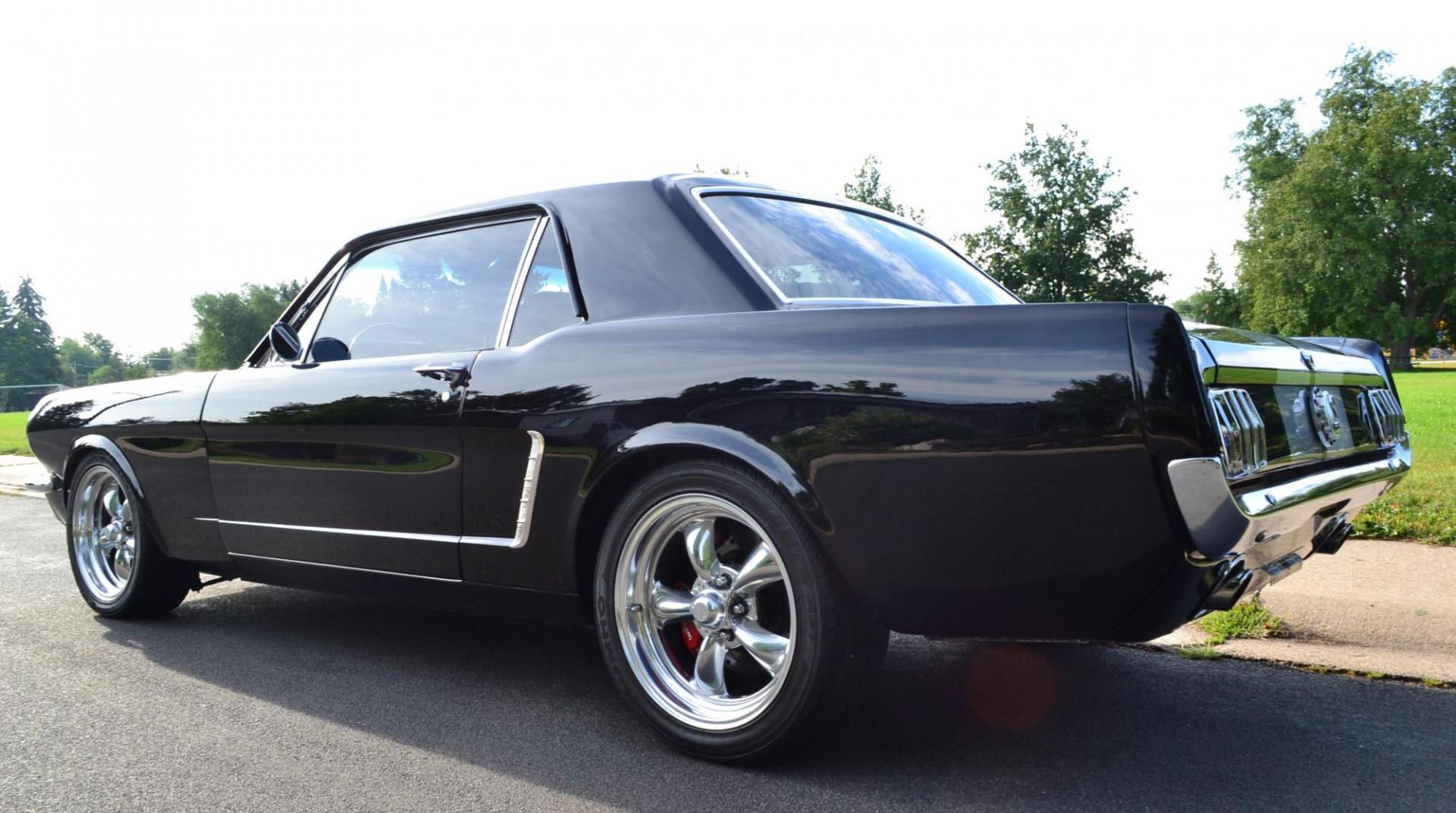 1965 Black /black Ford Mustang Standard (5F07A668786) with an 306ci engine, Manual transmission, located at 2510 47th St. Suite 200, Boulder, CO, 80301, (303) 641-0333, 40.026196, -105.243217 - This Custom Pro-Touring 1965 Mustang Coupe is Powered by a Newly Built 306ci Roller Engine with High Performance Cam, Roller Rockers and Aluminum Heads and Intake, (Edlebrock), Backed by a Tremec T5 5-Speed Manual Transmission and a Ford 9-inch Posi-Traction Rear Axle. It exhales through Ceramic Co - Photo#17