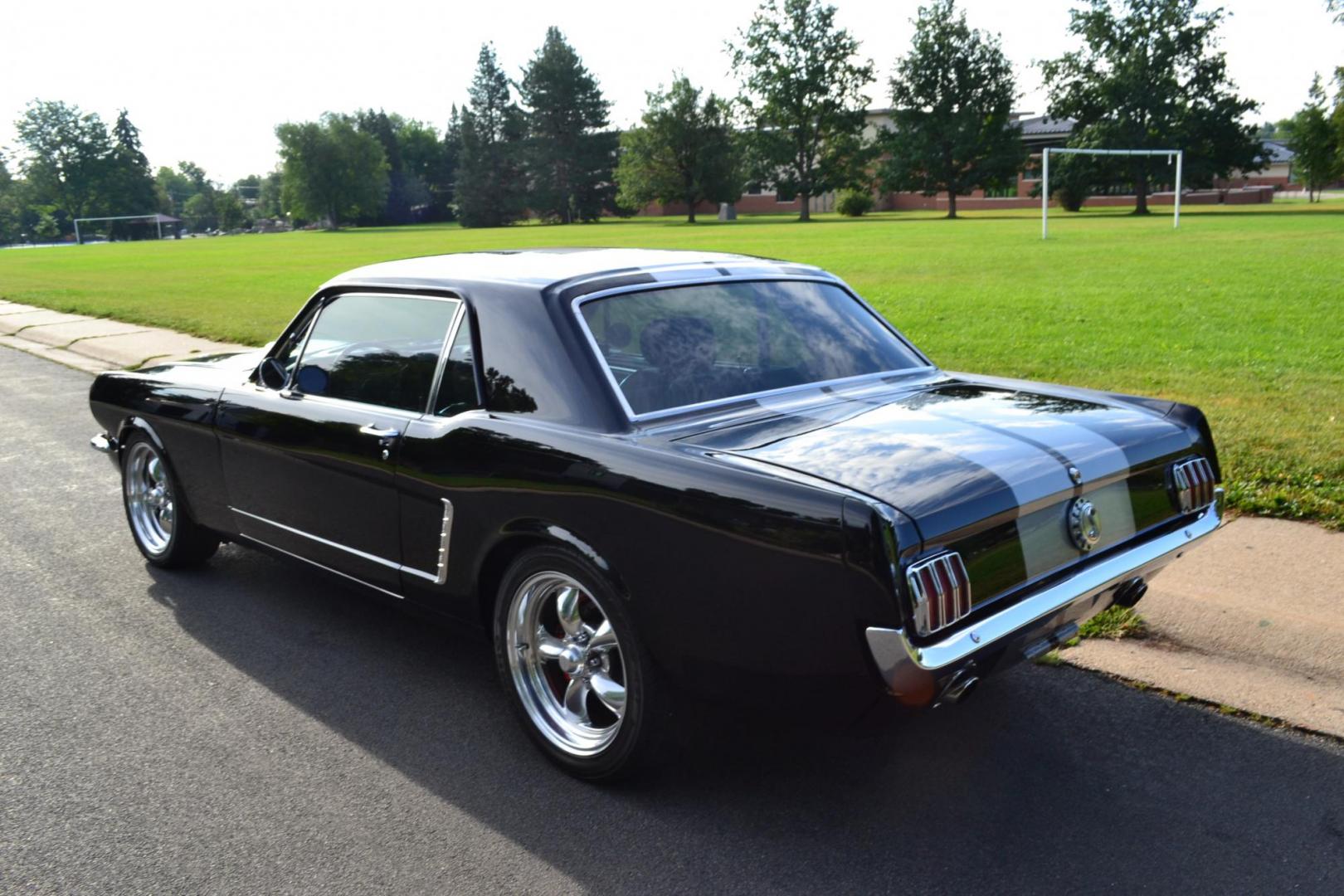 1965 Black /black Ford Mustang Standard (5F07A668786) with an 306ci engine, Manual transmission, located at 2510 47th St. Suite 200, Boulder, CO, 80301, (303) 641-0333, 40.026196, -105.243217 - This Custom Pro-Touring 1965 Mustang Coupe is Powered by a Newly Built 306ci Roller Engine with High Performance Cam, Roller Rockers and Aluminum Heads and Intake, (Edlebrock), Backed by a Tremec T5 5-Speed Manual Transmission and a Ford 9-inch Posi-Traction Rear Axle. It exhales through Ceramic Co - Photo#18