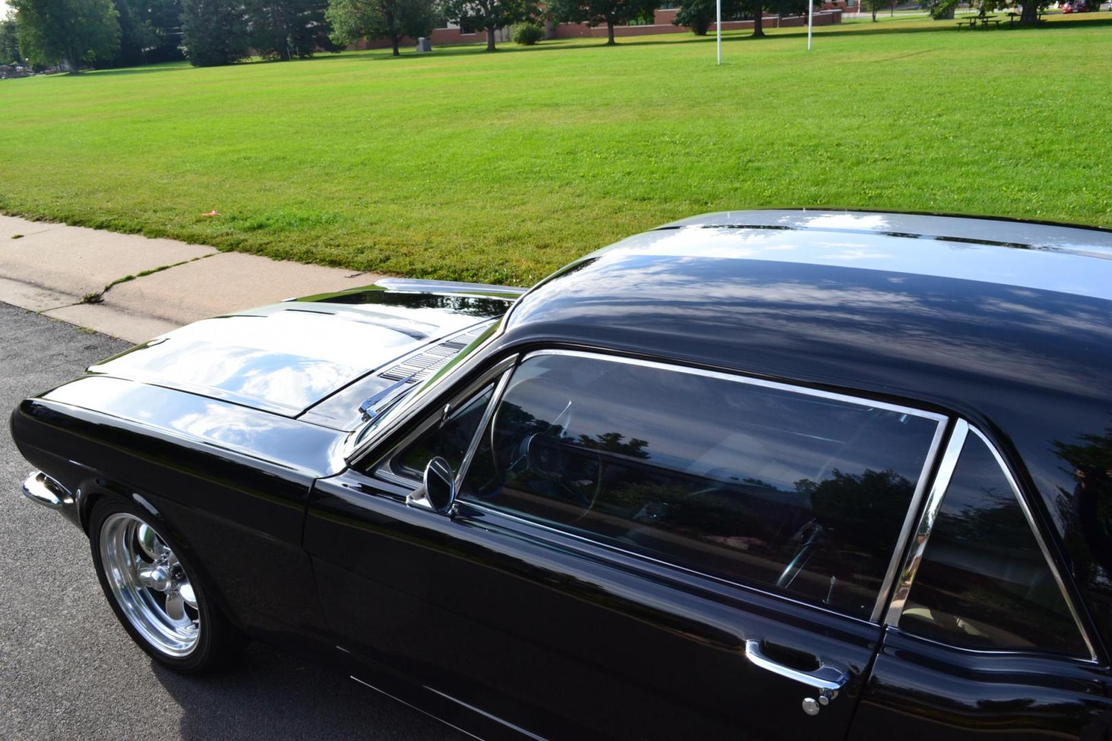 1965 Black /black Ford Mustang Standard (5F07A668786) with an 306ci engine, Manual transmission, located at 2510 47th St. Suite 200, Boulder, CO, 80301, (303) 641-0333, 40.026196, -105.243217 - This Custom Pro-Touring 1965 Mustang Coupe is Powered by a Newly Built 306ci Roller Engine with High Performance Cam, Roller Rockers and Aluminum Heads and Intake, (Edlebrock), Backed by a Tremec T5 5-Speed Manual Transmission and a Ford 9-inch Posi-Traction Rear Axle. It exhales through Ceramic Co - Photo#19