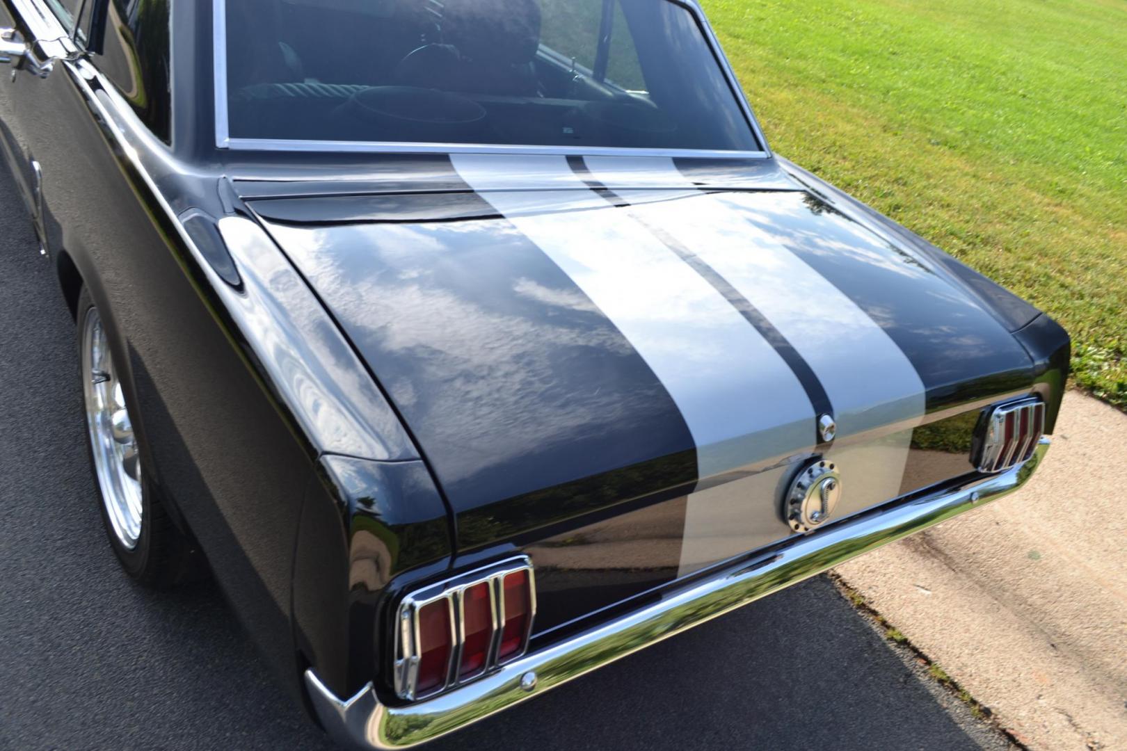 1965 Black /black Ford Mustang Standard (5F07A668786) with an 306ci engine, Manual transmission, located at 2510 47th St. Suite 200, Boulder, CO, 80301, (303) 641-0333, 40.026196, -105.243217 - This Custom Pro-Touring 1965 Mustang Coupe is Powered by a Newly Built 306ci Roller Engine with High Performance Cam, Roller Rockers and Aluminum Heads and Intake, (Edlebrock), Backed by a Tremec T5 5-Speed Manual Transmission and a Ford 9-inch Posi-Traction Rear Axle. It exhales through Ceramic Co - Photo#21