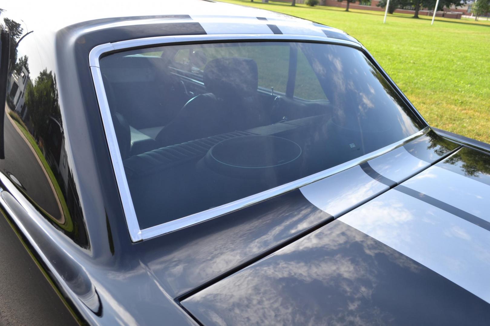 1965 Black /black Ford Mustang Standard (5F07A668786) with an 306ci engine, Manual transmission, located at 2510 47th St. Suite 200, Boulder, CO, 80301, (303) 641-0333, 40.026196, -105.243217 - This Custom Pro-Touring 1965 Mustang Coupe is Powered by a Newly Built 306ci Roller Engine with High Performance Cam, Roller Rockers and Aluminum Heads and Intake, (Edlebrock), Backed by a Tremec T5 5-Speed Manual Transmission and a Ford 9-inch Posi-Traction Rear Axle. It exhales through Ceramic Co - Photo#25