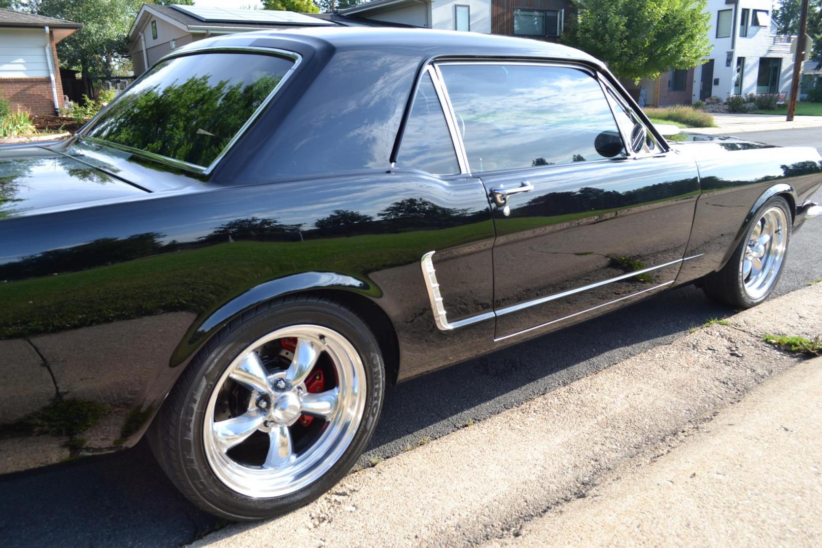 1965 Black /black Ford Mustang Standard (5F07A668786) with an 306ci engine, Manual transmission, located at 2510 47th St. Suite 200, Boulder, CO, 80301, (303) 641-0333, 40.026196, -105.243217 - This Custom Pro-Touring 1965 Mustang Coupe is Powered by a Newly Built 306ci Roller Engine with High Performance Cam, Roller Rockers and Aluminum Heads and Intake, (Edlebrock), Backed by a Tremec T5 5-Speed Manual Transmission and a Ford 9-inch Posi-Traction Rear Axle. It exhales through Ceramic Co - Photo#30