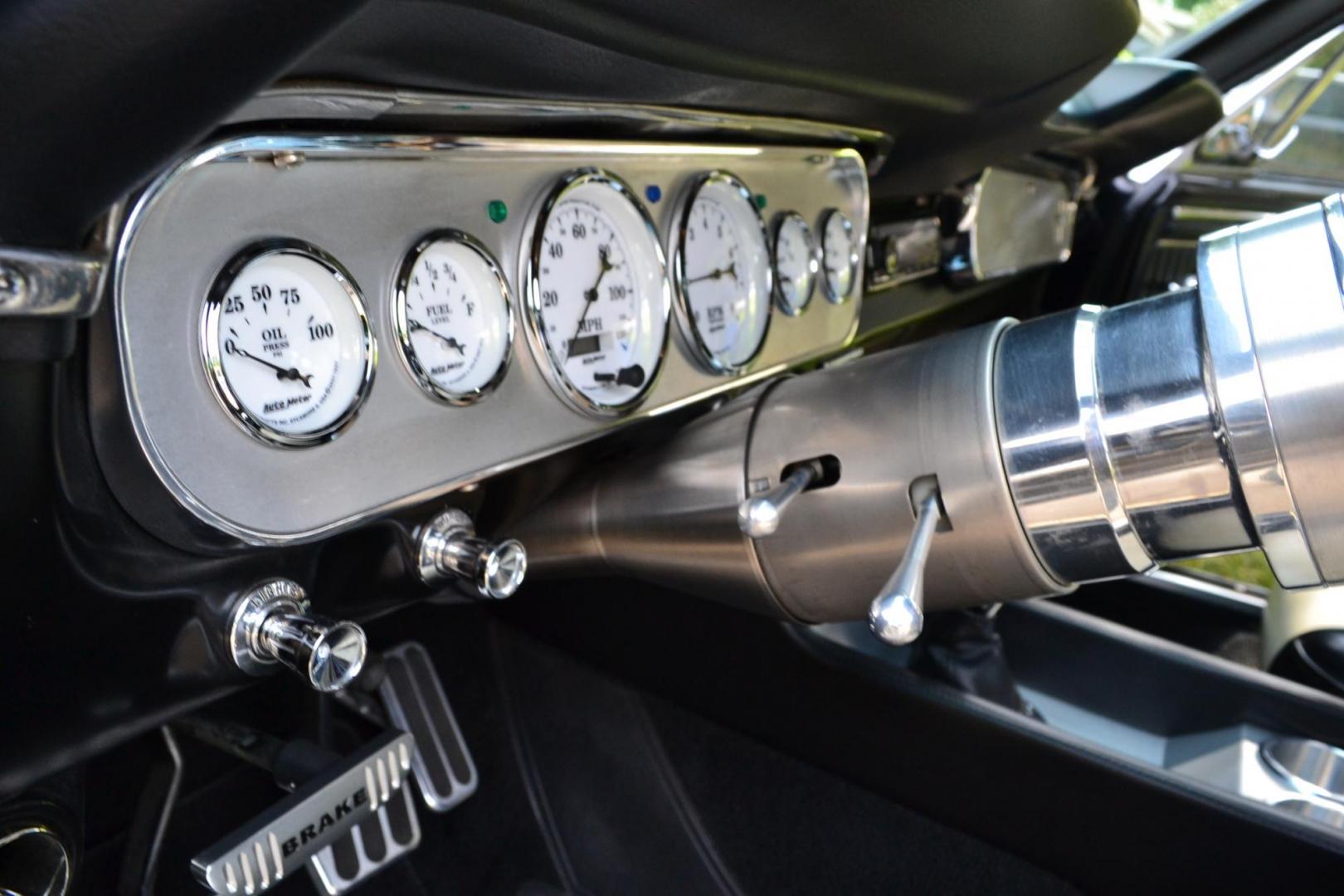 1965 Black /black Ford Mustang Standard (5F07A668786) with an 306ci engine, Manual transmission, located at 2510 47th St. Suite 200, Boulder, CO, 80301, (303) 641-0333, 40.026196, -105.243217 - This Custom Pro-Touring 1965 Mustang Coupe is Powered by a Newly Built 306ci Roller Engine with High Performance Cam, Roller Rockers and Aluminum Heads and Intake, (Edlebrock), Backed by a Tremec T5 5-Speed Manual Transmission and a Ford 9-inch Posi-Traction Rear Axle. It exhales through Ceramic Co - Photo#40