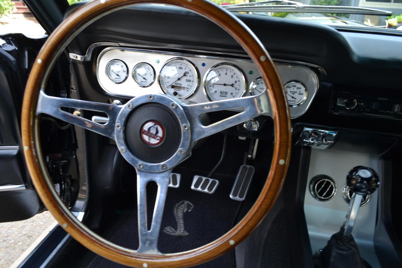 1965 Black /black Ford Mustang Standard (5F07A668786) with an 306ci engine, Manual transmission, located at 2510 47th St. Suite 200, Boulder, CO, 80301, (303) 641-0333, 40.026196, -105.243217 - This Custom Pro-Touring 1965 Mustang Coupe is Powered by a Newly Built 306ci Roller Engine with High Performance Cam, Roller Rockers and Aluminum Heads and Intake, (Edlebrock), Backed by a Tremec T5 5-Speed Manual Transmission and a Ford 9-inch Posi-Traction Rear Axle. It exhales through Ceramic Co - Photo#41