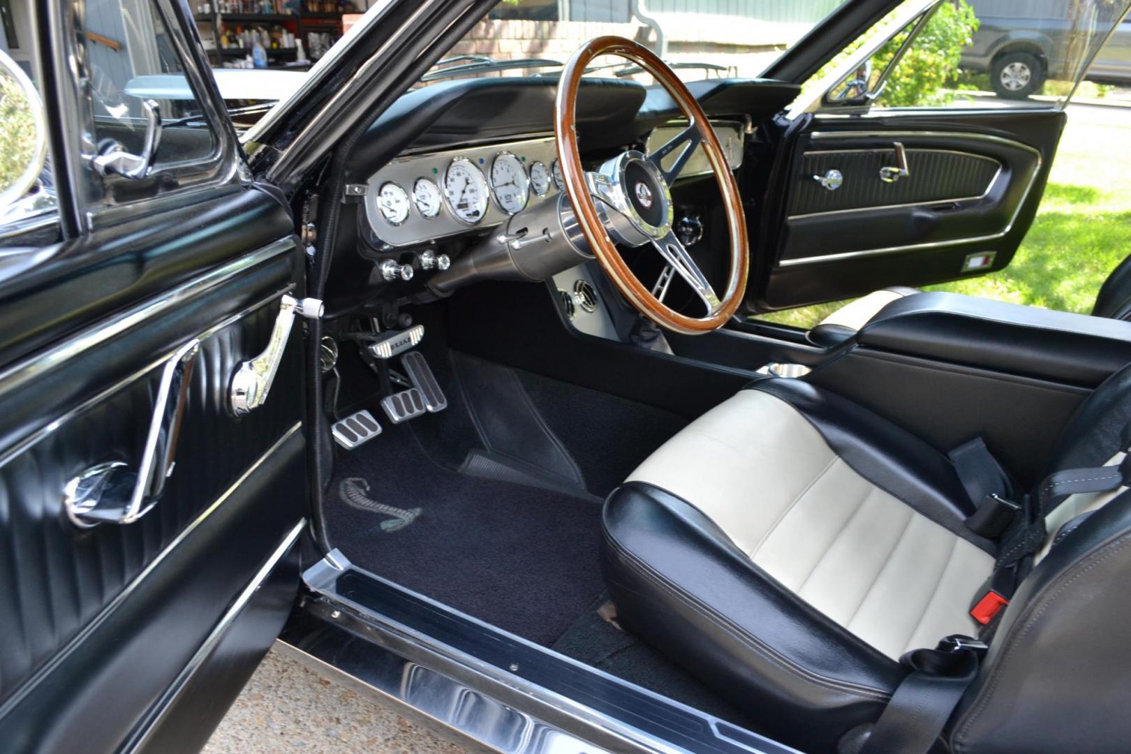 1965 Black /black Ford Mustang Standard (5F07A668786) with an 306ci engine, Manual transmission, located at 2510 47th St. Suite 200, Boulder, CO, 80301, (303) 641-0333, 40.026196, -105.243217 - This Custom Pro-Touring 1965 Mustang Coupe is Powered by a Newly Built 306ci Roller Engine with High Performance Cam, Roller Rockers and Aluminum Heads and Intake, (Edlebrock), Backed by a Tremec T5 5-Speed Manual Transmission and a Ford 9-inch Posi-Traction Rear Axle. It exhales through Ceramic Co - Photo#42