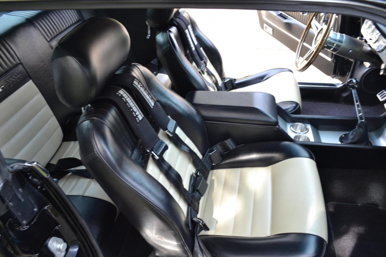 1965 Black /black Ford Mustang Standard (5F07A668786) with an 306ci engine, Manual transmission, located at 2510 47th St. Suite 200, Boulder, CO, 80301, (303) 641-0333, 40.026196, -105.243217 - This Custom Pro-Touring 1965 Mustang Coupe is Powered by a Newly Built 306ci Roller Engine with High Performance Cam, Roller Rockers and Aluminum Heads and Intake, (Edlebrock), Backed by a Tremec T5 5-Speed Manual Transmission and a Ford 9-inch Posi-Traction Rear Axle. It exhales through Ceramic Co - Photo#62