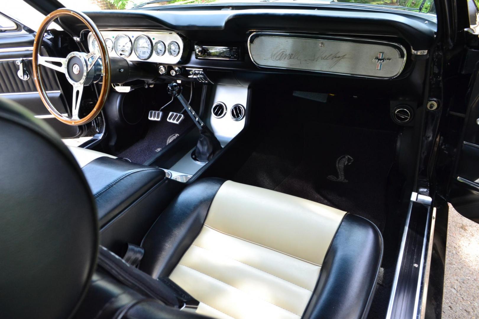 1965 Black /black Ford Mustang Standard (5F07A668786) with an 306ci engine, Manual transmission, located at 2510 47th St. Suite 200, Boulder, CO, 80301, (303) 641-0333, 40.026196, -105.243217 - This Custom Pro-Touring 1965 Mustang Coupe is Powered by a Newly Built 306ci Roller Engine with High Performance Cam, Roller Rockers and Aluminum Heads and Intake, (Edlebrock), Backed by a Tremec T5 5-Speed Manual Transmission and a Ford 9-inch Posi-Traction Rear Axle. It exhales through Ceramic Co - Photo#64