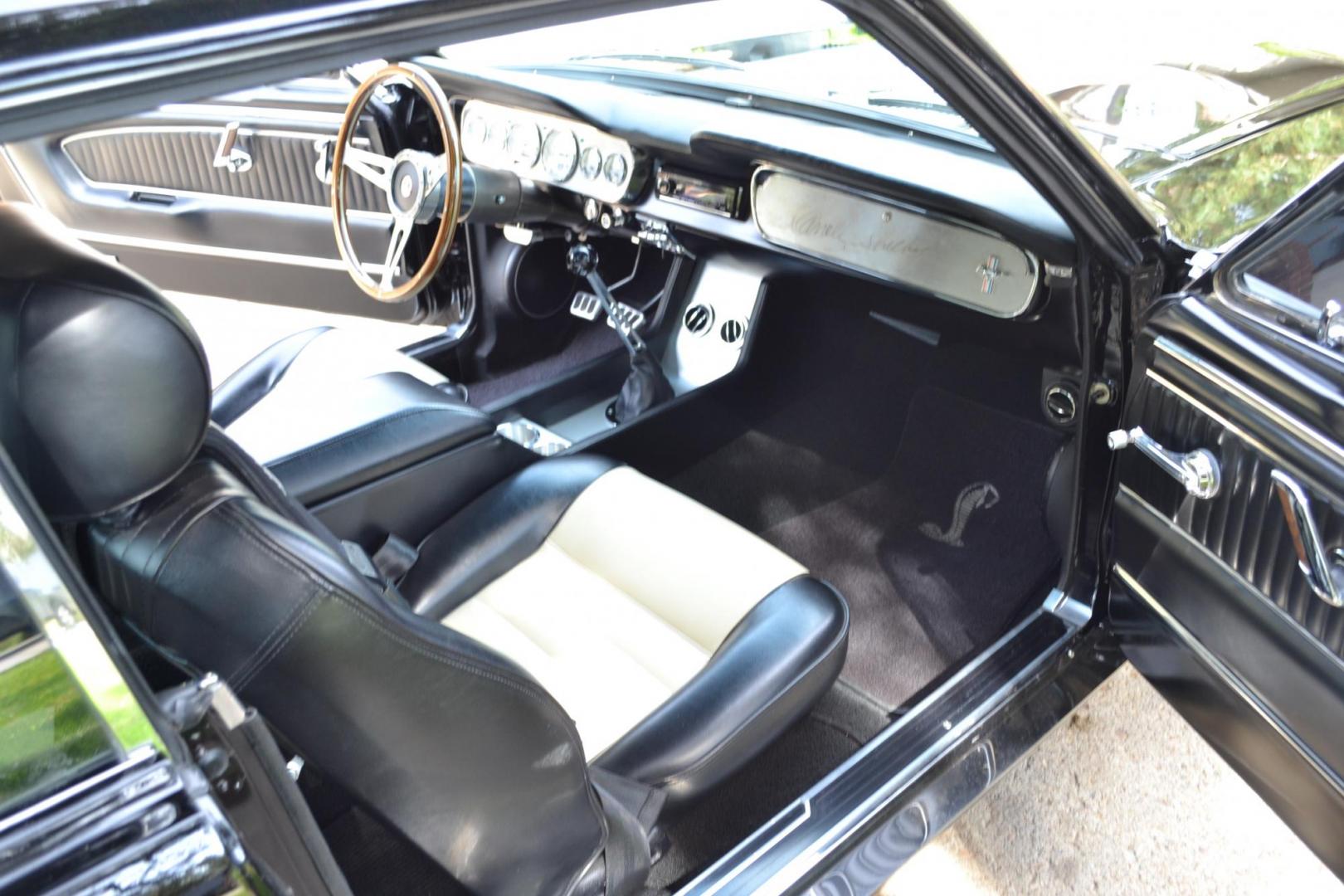 1965 Black /black Ford Mustang Standard (5F07A668786) with an 306ci engine, Manual transmission, located at 2510 47th St. Suite 200, Boulder, CO, 80301, (303) 641-0333, 40.026196, -105.243217 - This Custom Pro-Touring 1965 Mustang Coupe is Powered by a Newly Built 306ci Roller Engine with High Performance Cam, Roller Rockers and Aluminum Heads and Intake, (Edlebrock), Backed by a Tremec T5 5-Speed Manual Transmission and a Ford 9-inch Posi-Traction Rear Axle. It exhales through Ceramic Co - Photo#65