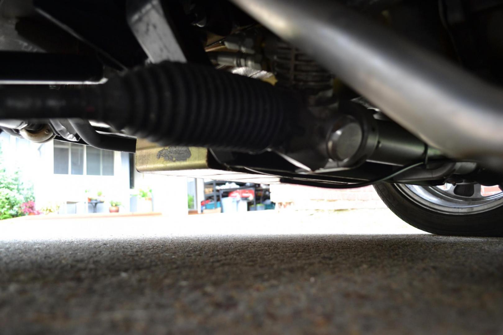 1965 Black /black Ford Mustang Standard (5F07A668786) with an 306ci engine, Manual transmission, located at 2510 47th St. Suite 200, Boulder, CO, 80301, (303) 641-0333, 40.026196, -105.243217 - This Custom Pro-Touring 1965 Mustang Coupe is Powered by a Newly Built 306ci Roller Engine with High Performance Cam, Roller Rockers and Aluminum Heads and Intake, (Edlebrock), Backed by a Tremec T5 5-Speed Manual Transmission and a Ford 9-inch Posi-Traction Rear Axle. It exhales through Ceramic Co - Photo#99