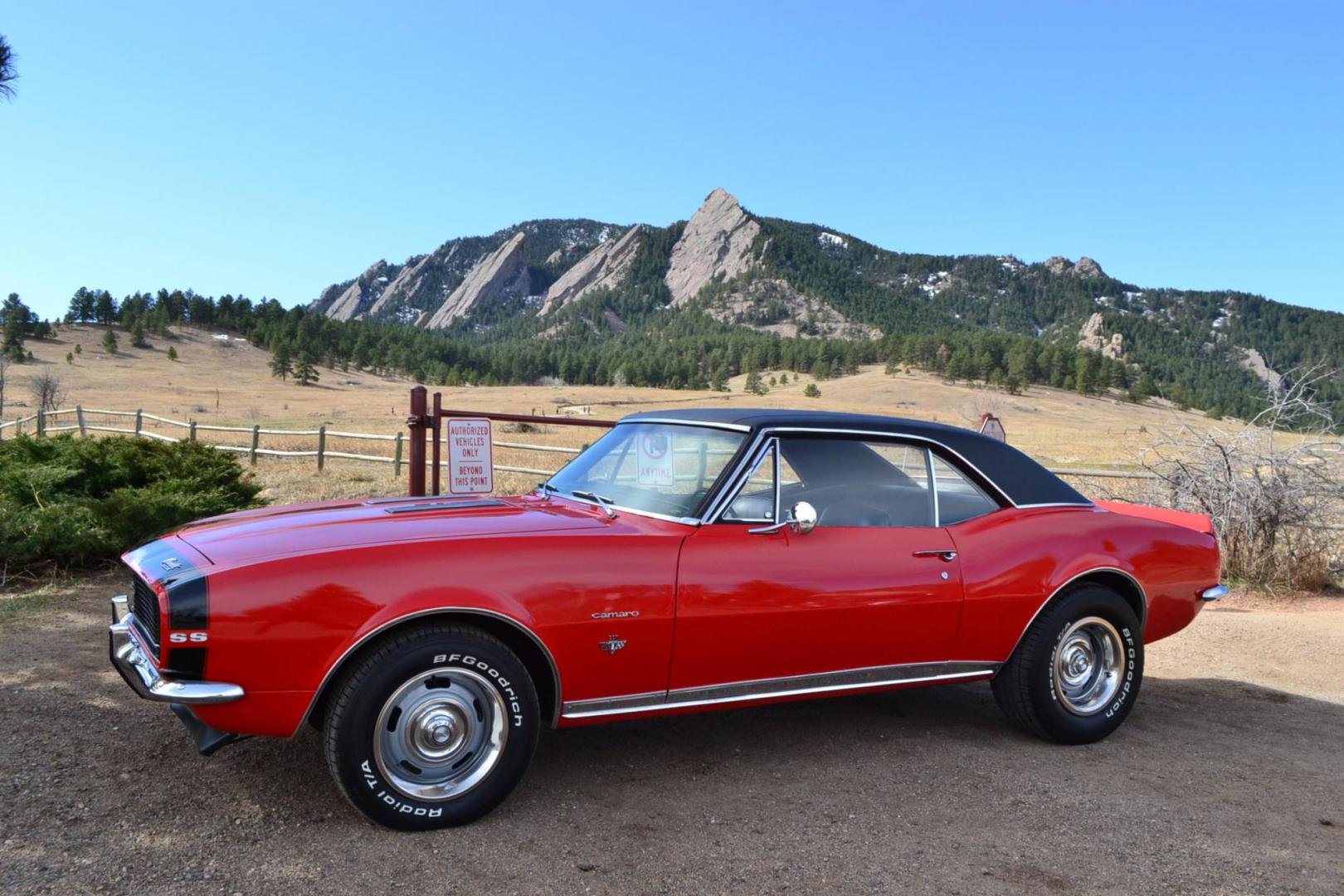 1967 Red /Black Chevrolet Camaro RS/SS (123377N2304) with an V8 engine, Automatic transmission, located at 2510 47th St. Suite 200, Boulder, CO, 80301, (303) 641-0333, 40.026196, -105.243217 - This 1967 Chevrolet Camaro received a recent Comprehensive Restoration. It is Shown In Rally Red with RS/SS specification. A Chevrolet 350ci High Performance V8 Engine is Backed by a Turbo 350 Automatic Transmission And a 12-Bolt Rear End. This Coupe Features Power Steering, Power Brakes, Hideaway L - Photo#0