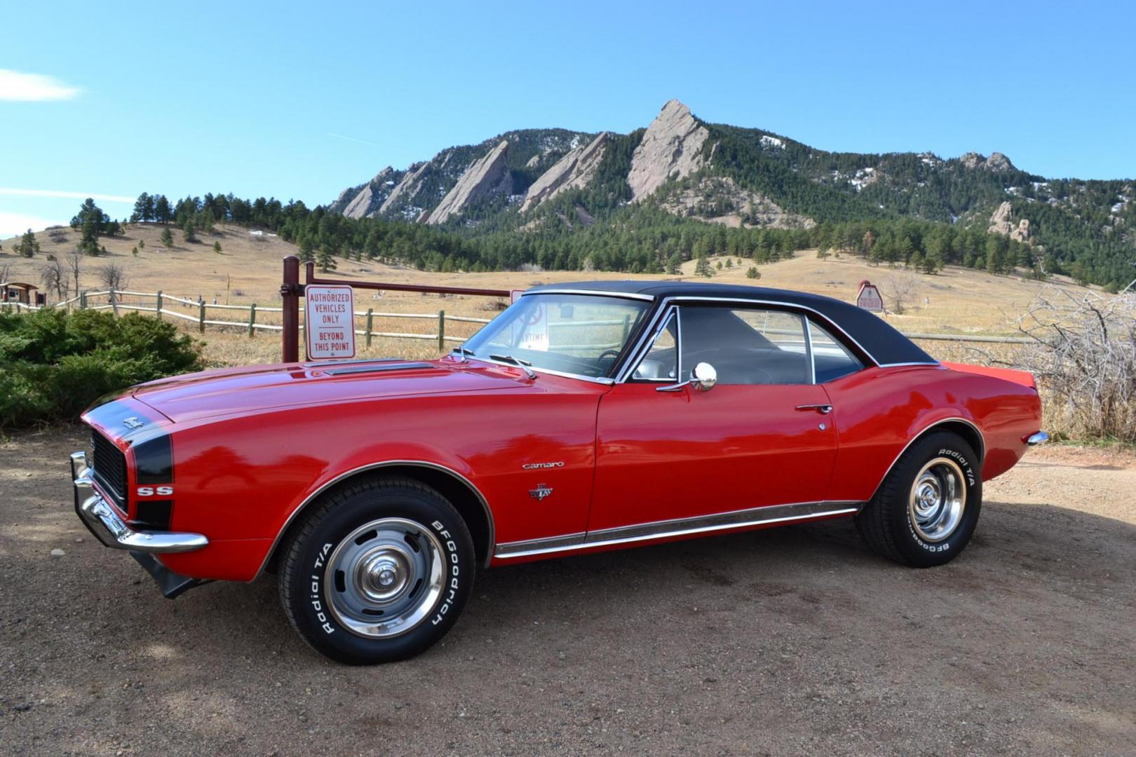 1967 Red /Black Chevrolet Camaro RS/SS (123377N2304) with an V8 engine, Automatic transmission, located at 2510 47th St. Suite 200, Boulder, CO, 80301, (303) 641-0333, 40.026196, -105.243217 - This 1967 Chevrolet Camaro received a recent Comprehensive Restoration. It is Shown In Rally Red with RS/SS specification. A Chevrolet 350ci High Performance V8 Engine is Backed by a Turbo 350 Automatic Transmission And a 12-Bolt Rear End. This Coupe Features Power Steering, Power Brakes, Hideaway L - Photo#1