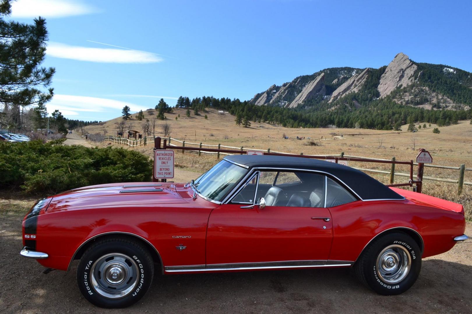 1967 Red /Black Chevrolet Camaro RS/SS (123377N2304) with an V8 engine, Automatic transmission, located at 2510 47th St. Suite 200, Boulder, CO, 80301, (303) 641-0333, 40.026196, -105.243217 - This 1967 Chevrolet Camaro received a recent Comprehensive Restoration. It is Shown In Rally Red with RS/SS specification. A Chevrolet 350ci High Performance V8 Engine is Backed by a Turbo 350 Automatic Transmission And a 12-Bolt Rear End. This Coupe Features Power Steering, Power Brakes, Hideaway L - Photo#2