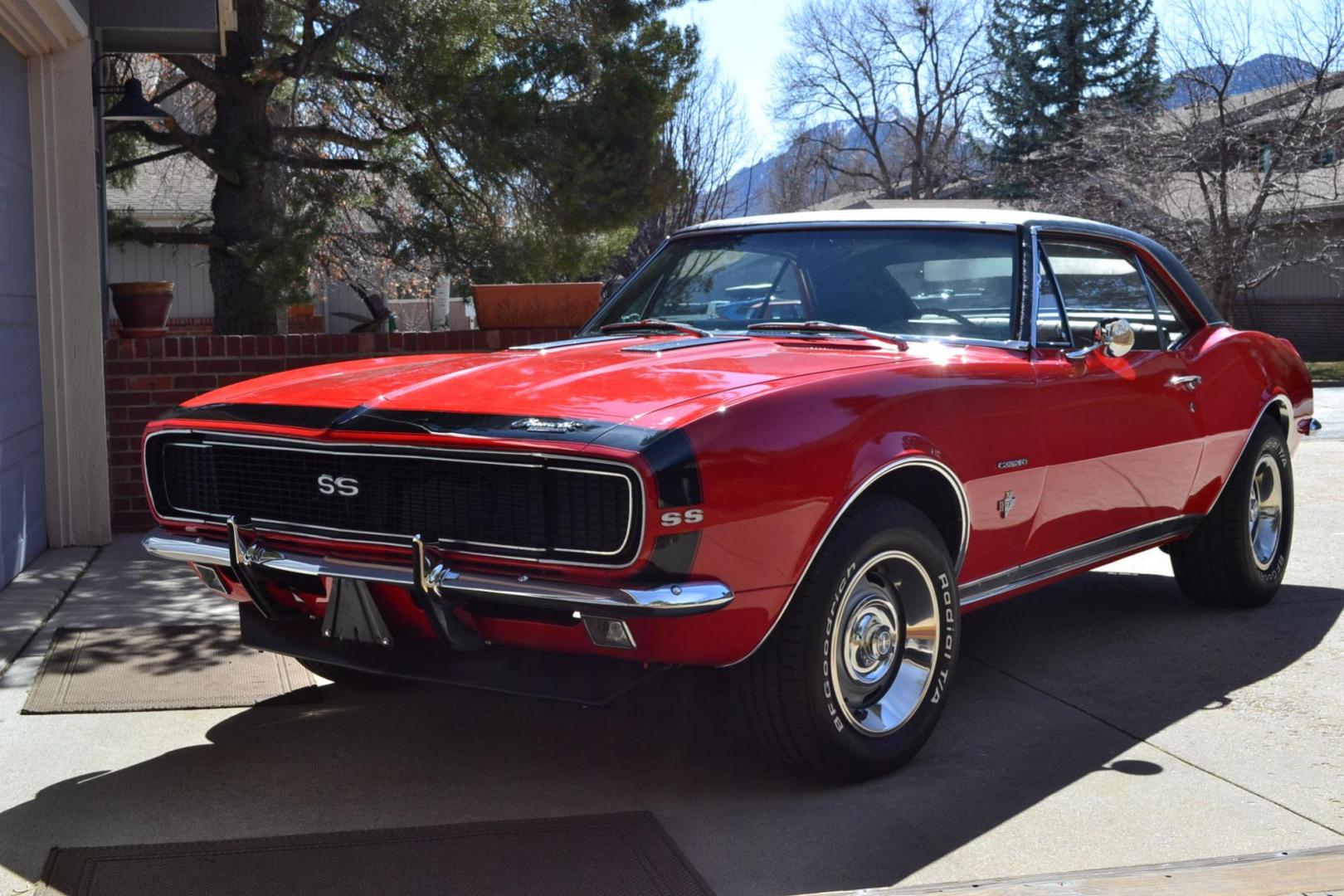 1967 Red /Black Chevrolet Camaro RS/SS (123377N2304) with an V8 engine, Automatic transmission, located at 2510 47th St. Suite 200, Boulder, CO, 80301, (303) 641-0333, 40.026196, -105.243217 - This 1967 Chevrolet Camaro received a recent Comprehensive Restoration. It is Shown In Rally Red with RS/SS specification. A Chevrolet 350ci High Performance V8 Engine is Backed by a Turbo 350 Automatic Transmission And a 12-Bolt Rear End. This Coupe Features Power Steering, Power Brakes, Hideaway L - Photo#25