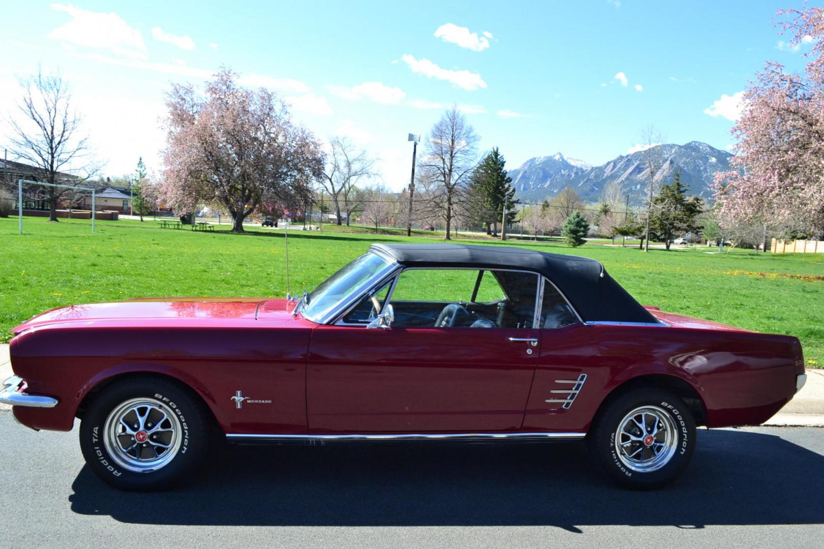 1966 Red /Black Ford Mustang Standard (6T08T165419) with an 302 V8 engine, Manual transmission, located at 2510 47th St. Suite 200, Boulder, CO, 80301, (303) 641-0333, 40.026196, -105.243217 - This 1966 Mustang is a Refreshed Convertible Powered by a 302 V8 paired with a 4 speed Manual Transmission. It is Equipped with an Edelbrock Carburetor, Intake Manifold, Ford Racing Valve Covers, GT Light Bar, Dual Exhaust, Chrome Mustang Styled Steel Wheels with BF Goodrich Solid White Letter Radia - Photo#4