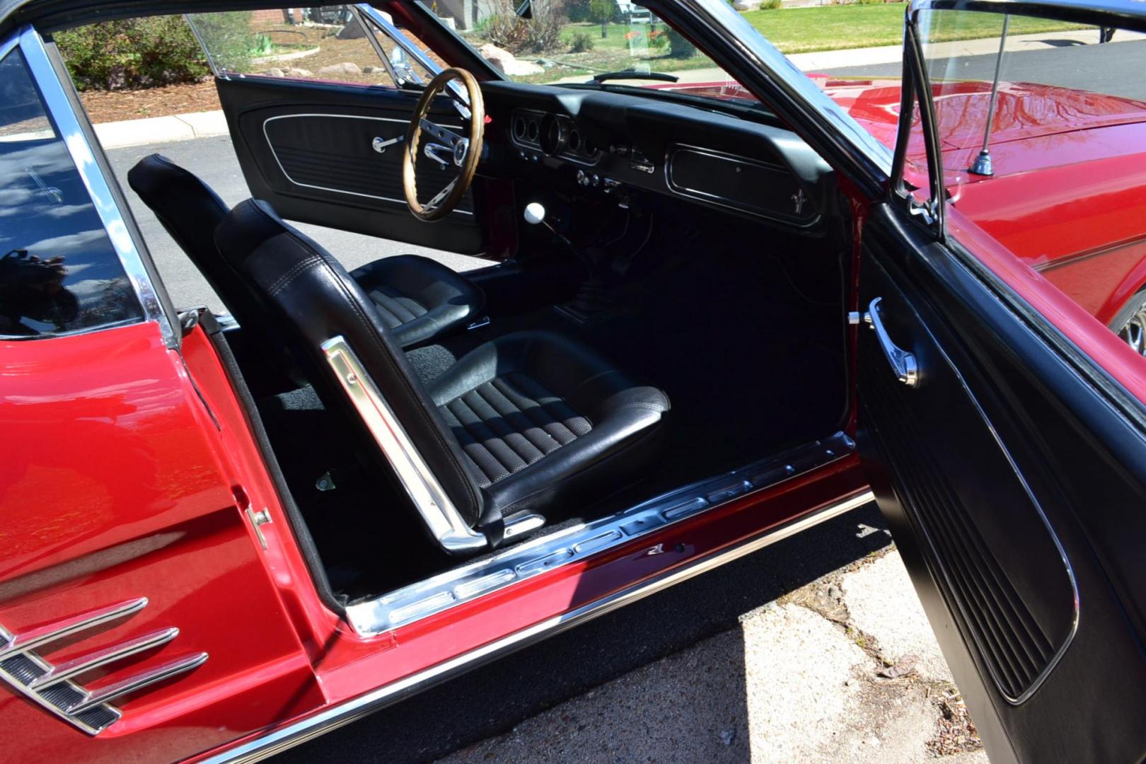 1966 Red /Black Ford Mustang Standard (6T08T165419) with an 302 V8 engine, Manual transmission, located at 2510 47th St. Suite 200, Boulder, CO, 80301, (303) 641-0333, 40.026196, -105.243217 - This 1966 Mustang is a Refreshed Convertible Powered by a 302 V8 paired with a 4 speed Manual Transmission. It is Equipped with an Edelbrock Carburetor, Intake Manifold, Ford Racing Valve Covers, GT Light Bar, Dual Exhaust, Chrome Mustang Styled Steel Wheels with BF Goodrich Solid White Letter Radia - Photo#14