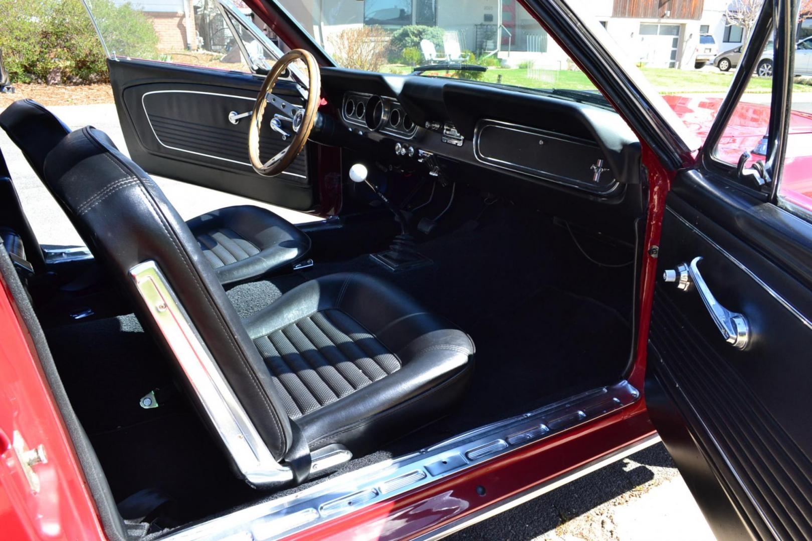 1966 Red /Black Ford Mustang Standard (6T08T165419) with an 302 V8 engine, Manual transmission, located at 2510 47th St. Suite 200, Boulder, CO, 80301, (303) 641-0333, 40.026196, -105.243217 - This 1966 Mustang is a Refreshed Convertible Powered by a 302 V8 paired with a 4 speed Manual Transmission. It is Equipped with an Edelbrock Carburetor, Intake Manifold, Ford Racing Valve Covers, GT Light Bar, Dual Exhaust, Chrome Mustang Styled Steel Wheels with BF Goodrich Solid White Letter Radia - Photo#15
