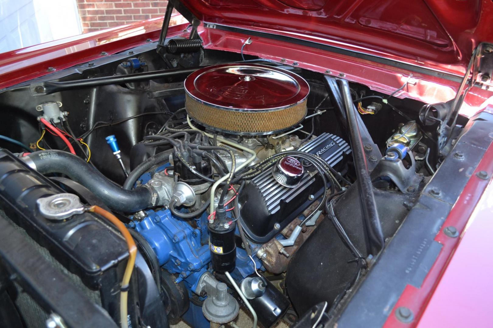 1966 Red /Black Ford Mustang Standard (6T08T165419) with an 302 V8 engine, Manual transmission, located at 2510 47th St. Suite 200, Boulder, CO, 80301, (303) 641-0333, 40.026196, -105.243217 - This 1966 Mustang is a Refreshed Convertible Powered by a 302 V8 paired with a 4 speed Manual Transmission. It is Equipped with an Edelbrock Carburetor, Intake Manifold, Ford Racing Valve Covers, GT Light Bar, Dual Exhaust, Chrome Mustang Styled Steel Wheels with BF Goodrich Solid White Letter Radia - Photo#20