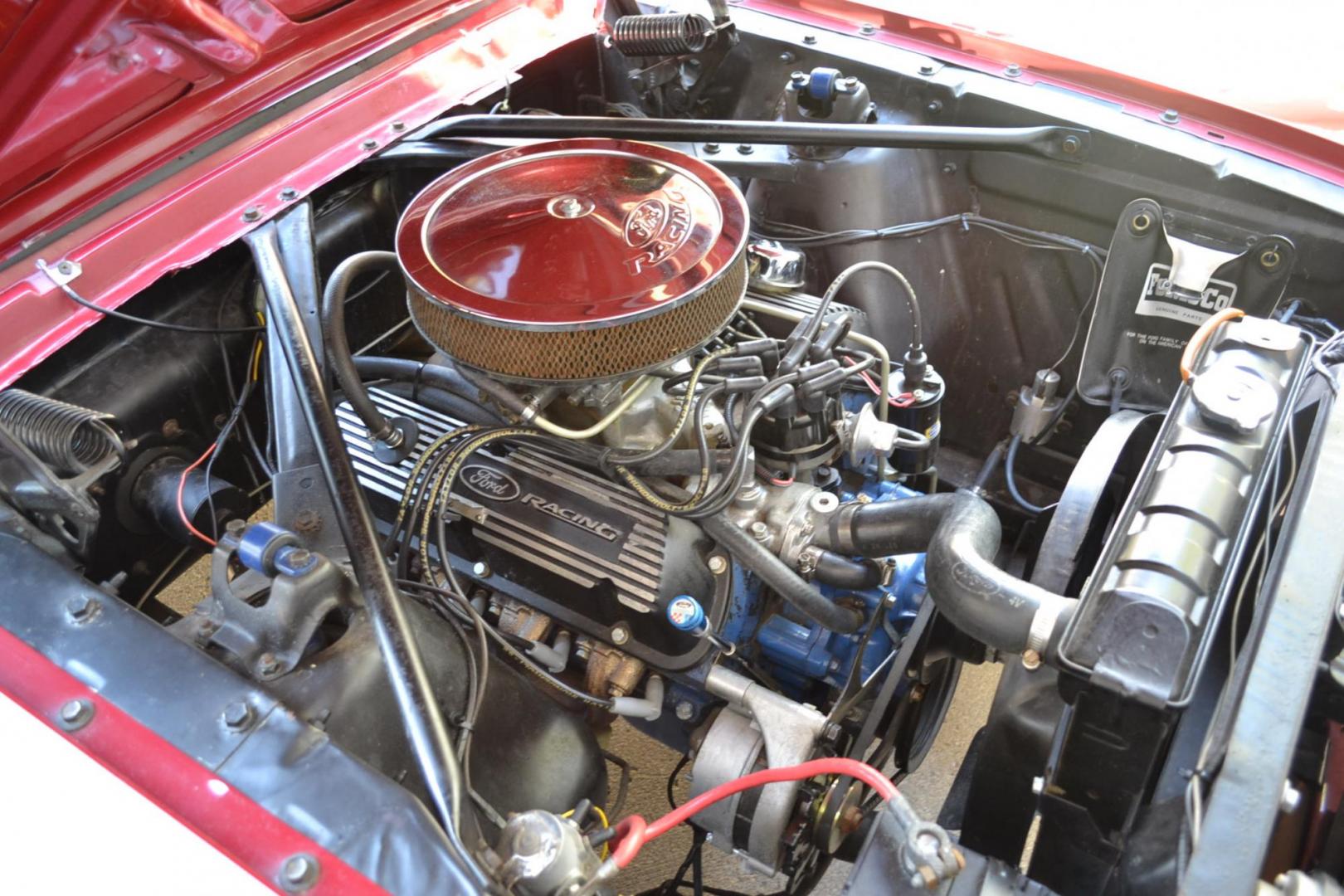 1966 Red /Black Ford Mustang Standard (6T08T165419) with an 302 V8 engine, Manual transmission, located at 2510 47th St. Suite 200, Boulder, CO, 80301, (303) 641-0333, 40.026196, -105.243217 - This 1966 Mustang is a Refreshed Convertible Powered by a 302 V8 paired with a 4 speed Manual Transmission. It is Equipped with an Edelbrock Carburetor, Intake Manifold, Ford Racing Valve Covers, GT Light Bar, Dual Exhaust, Chrome Mustang Styled Steel Wheels with BF Goodrich Solid White Letter Radia - Photo#22