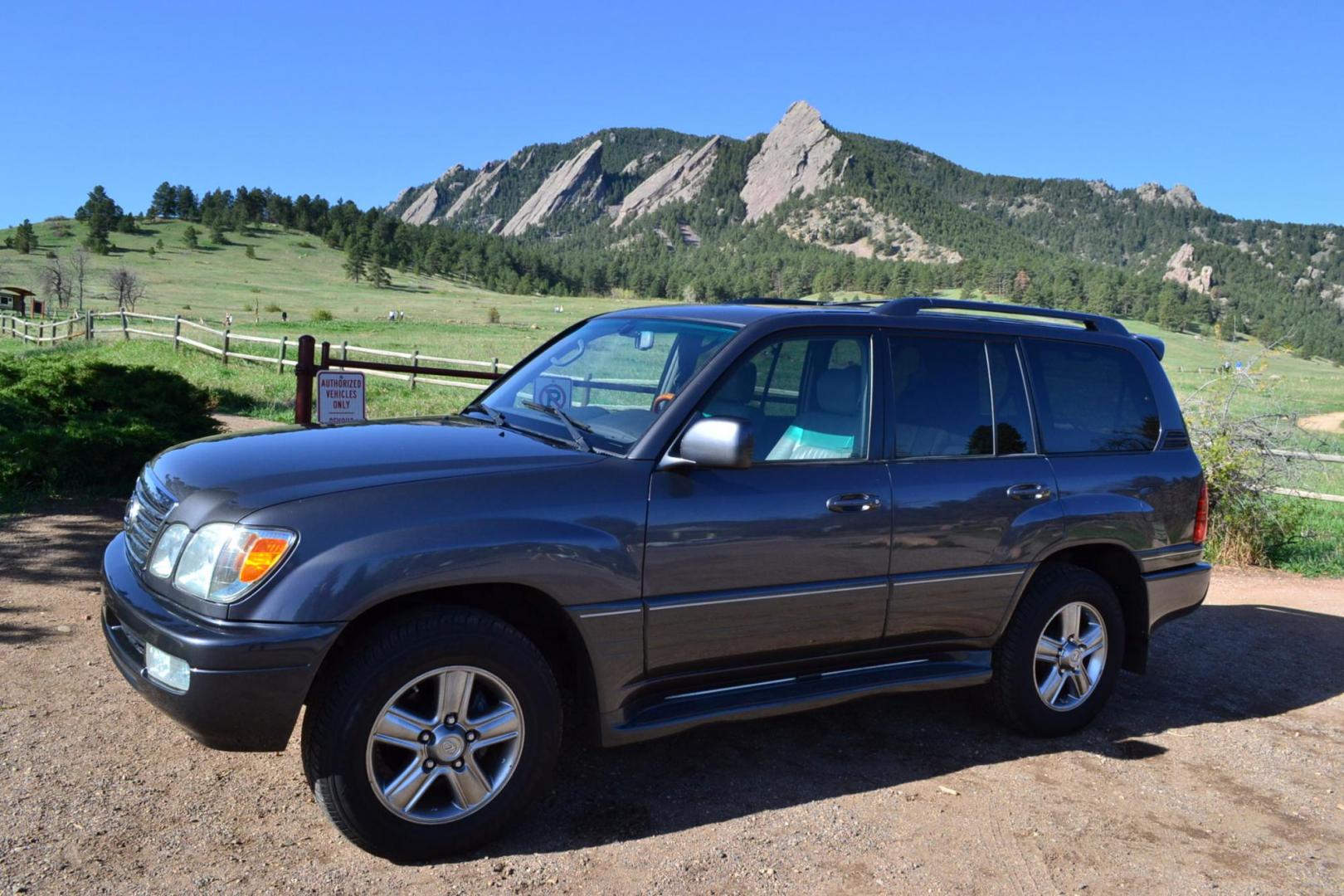 2006 Gray /Gray Lexus LX 470 Sport Utility (JTJHT00W464) with an 4.7L V8 DOHC 32V engine, 5-Speed Automatic Overdrive transmission, located at 2510 47th St. Suite 200, Boulder, CO, 80301, (303) 641-0333, 40.026196, -105.243217 - This Great One Owner, Low Mile, Non Smoker Female Driven LX470 is a New Lexus Trade in Recently Acquired by Boulder Motors of Boulder Colorado. It is Finished in Lexus Galactic Gray Mica with Gray Interior. A Flawless CarFax and AutoCheck Showing No Accidents, Odometer or Problems Reported EVER acc - Photo#0